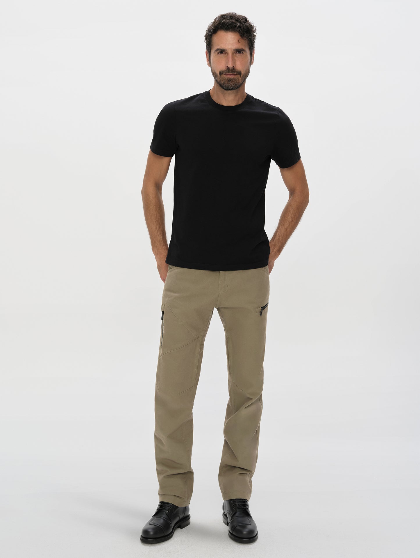 Front, full-body view of man wearing the Mojave Motorcycle Pant 2.0 in Stone Brown from AETHER Apparel.