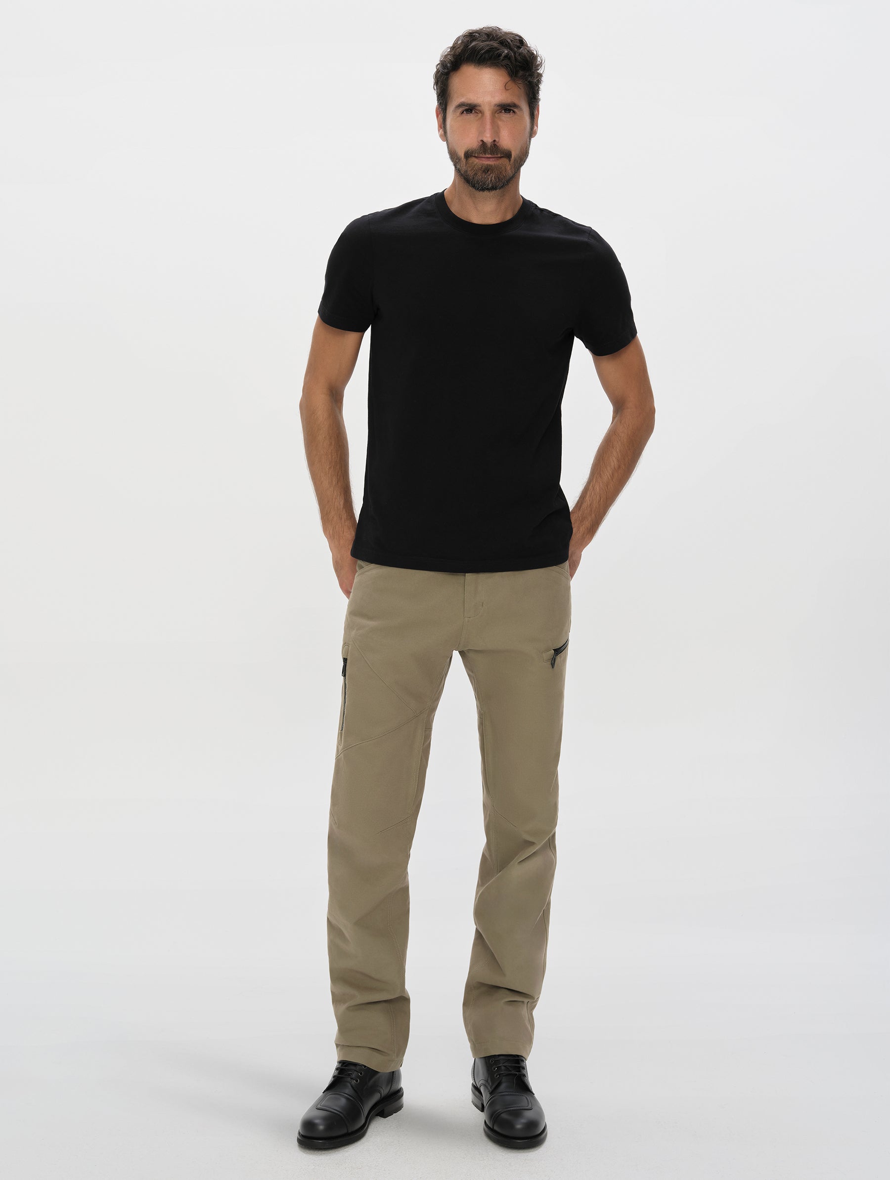 Front, full-body view of man wearing the Mojave Motorcycle Pant 2.0 in Stone Brown from AETHER Apparel.