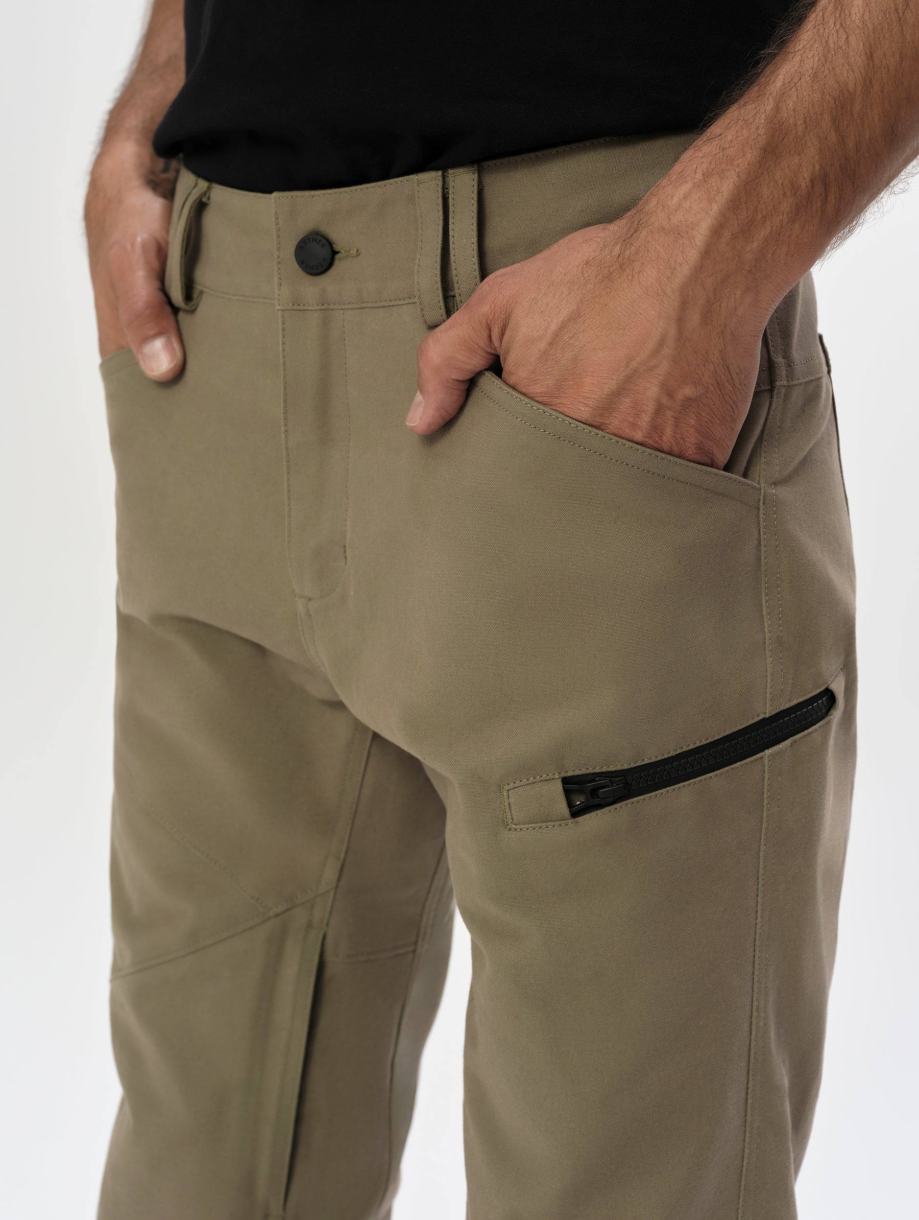 Closeup detailed view of the hand and thigh pockets on the Mojave Motorcycle Pant 2.0 in Stone Brown from AETHER Apparel.