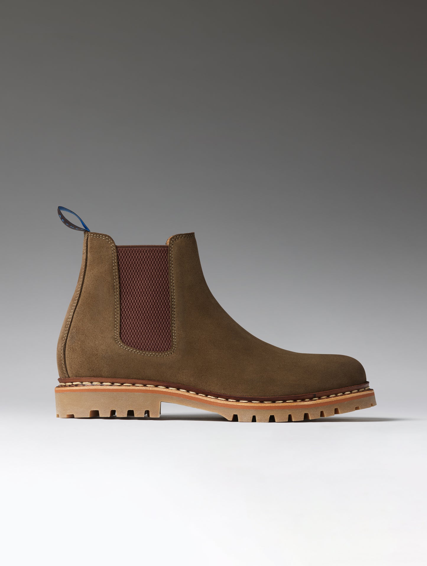 Side profile view of the Monroe Chelsea Boot in Dark Olive from AETHER Apparel.