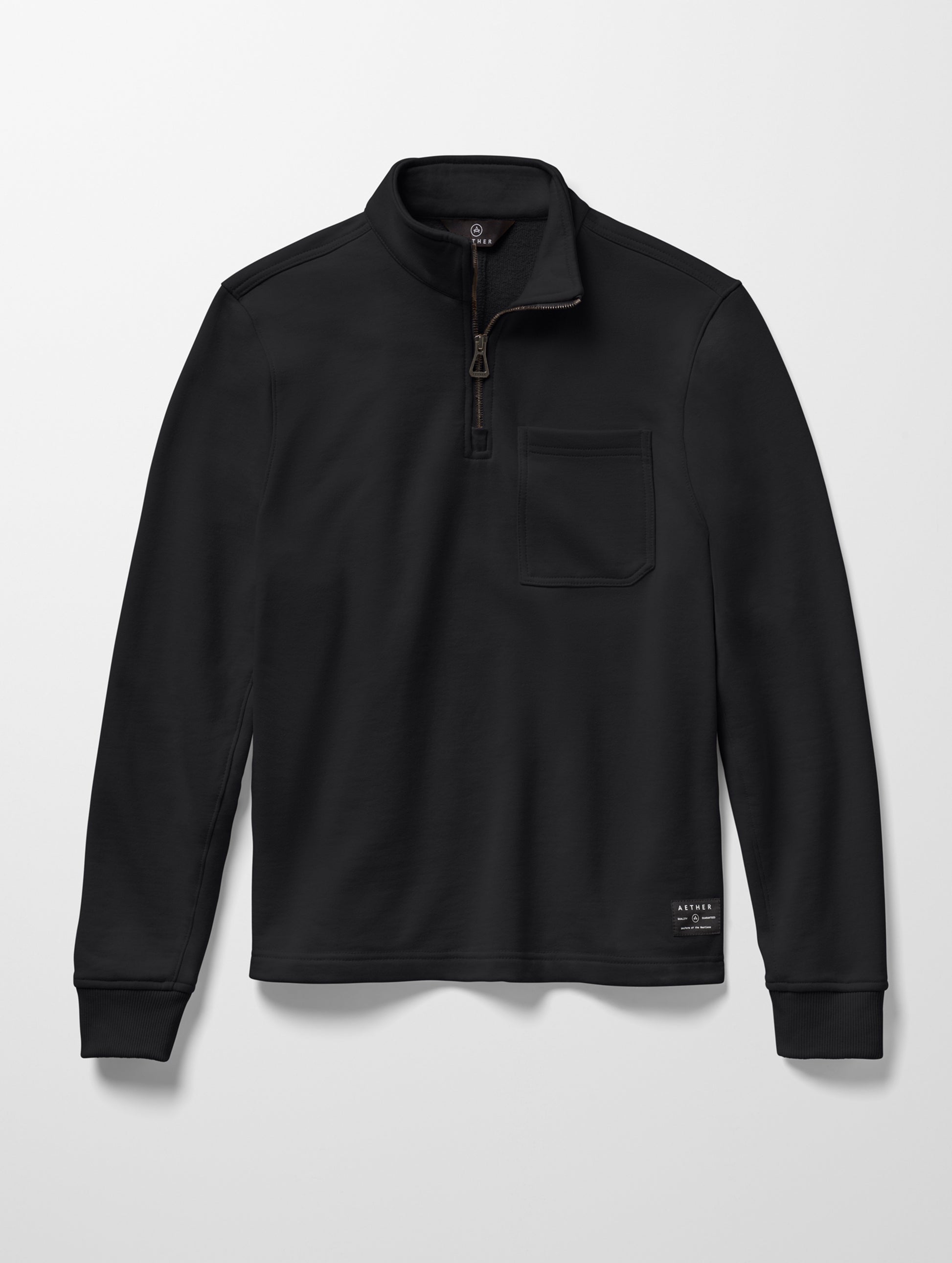 Flat lay image of men's Monte Half-Zip Sweatshirt in Onyx Black from AETHER Apparel.