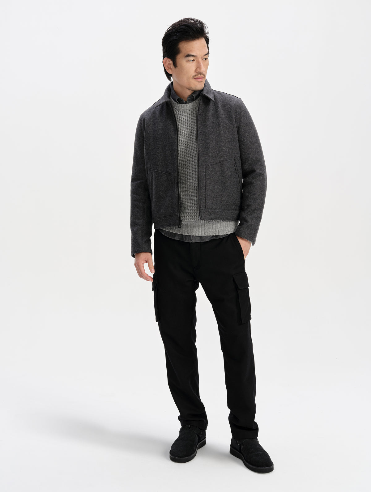 Front full-body view of man wearing the Monza Wool Jacket 2.0 in Charcoal Grey from AETHER Apparel.