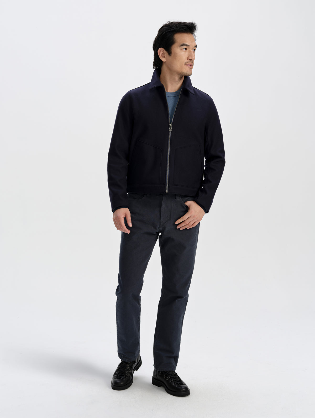 Front full-body view of man wearing the Monza Wool Jacket 2.0 in Total Eclipse from AETHER Apparel.