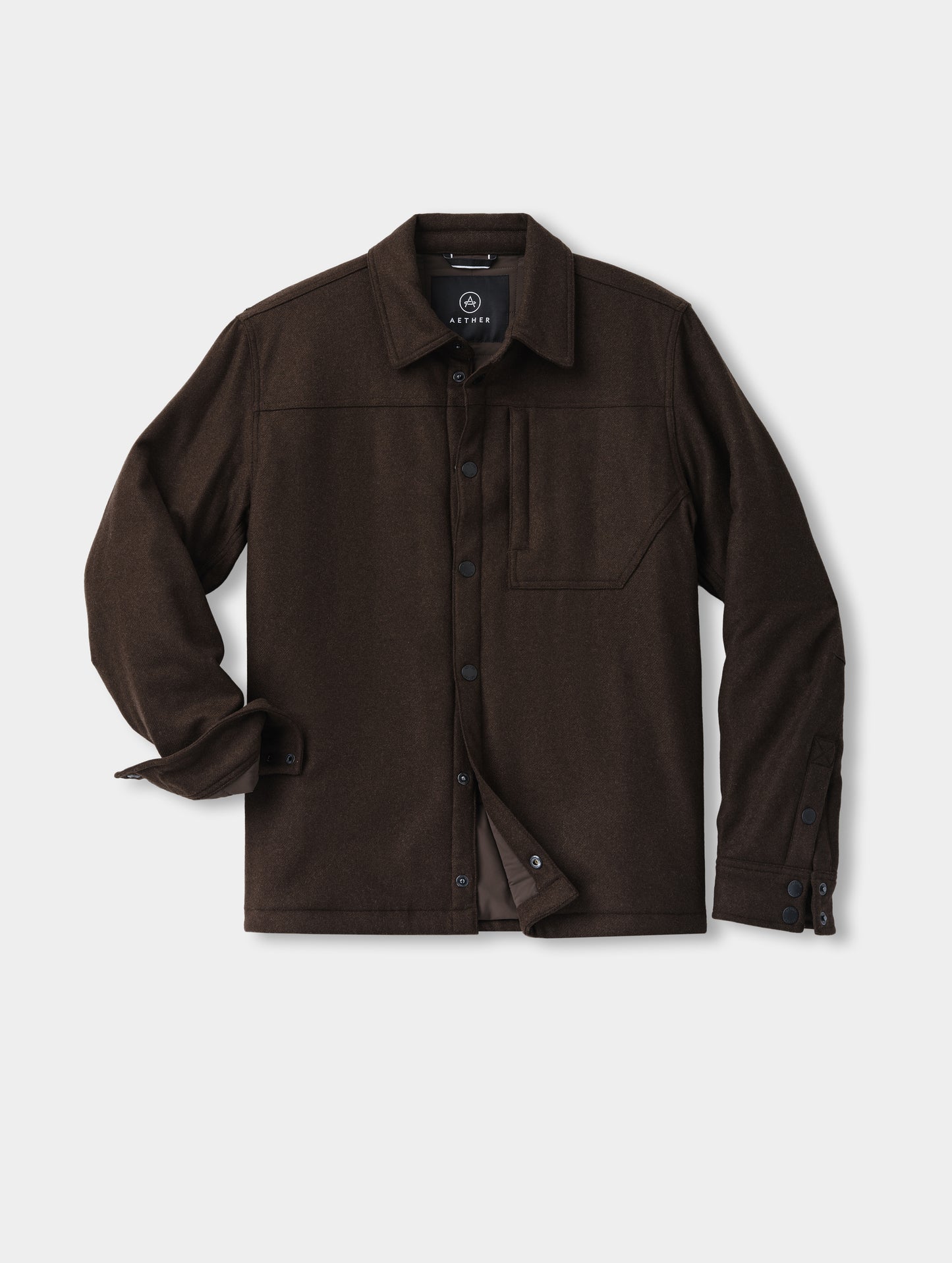 Flat lay of the Nova Insulated Button-Down in Ash Brown from AETHER Apparel.