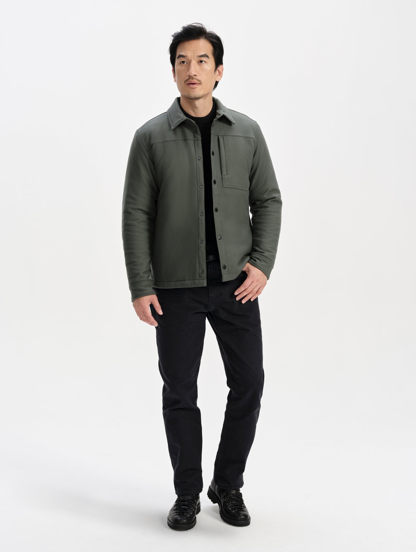 Front full-body view of man wearing the Nova Insulated Button-Down in Saville Green from AETHER Apparel.