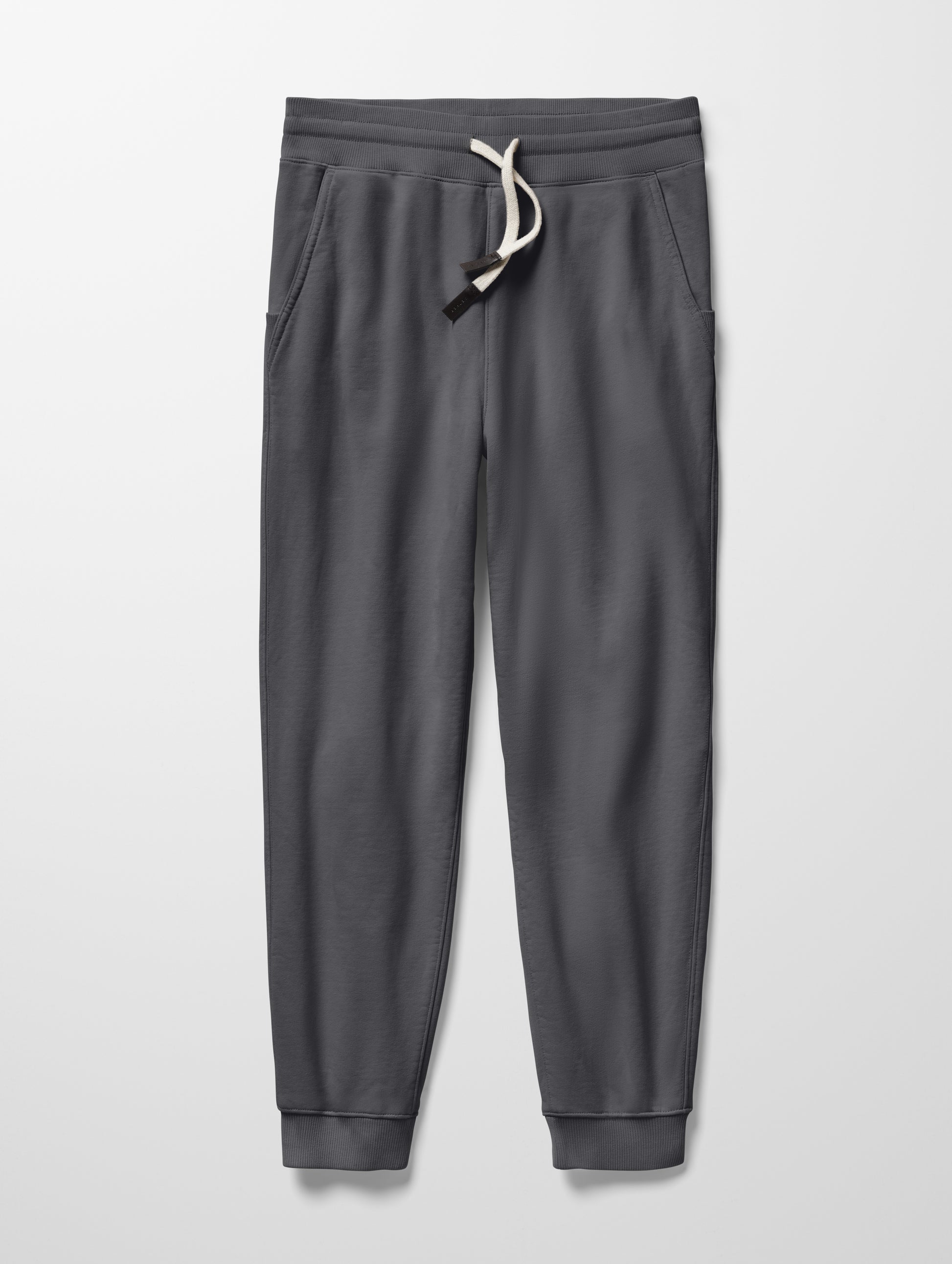 Flat lay of Osa Cuffed Sweatpant in Graphite grey from AETHER Apparel.