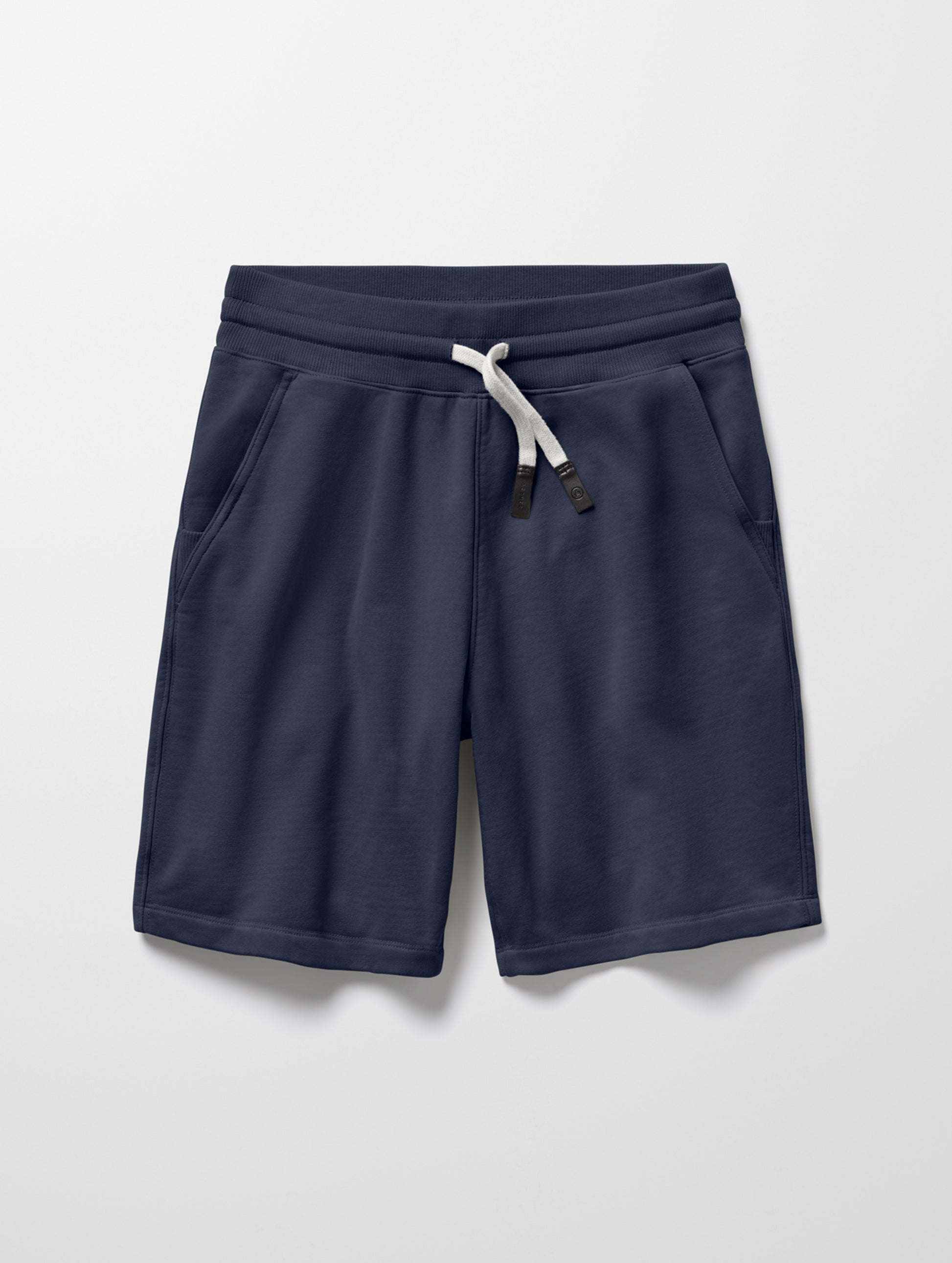 Flat lay of Osa Sweatshort in Total Eclipse dark blue from AETHER Apparel.