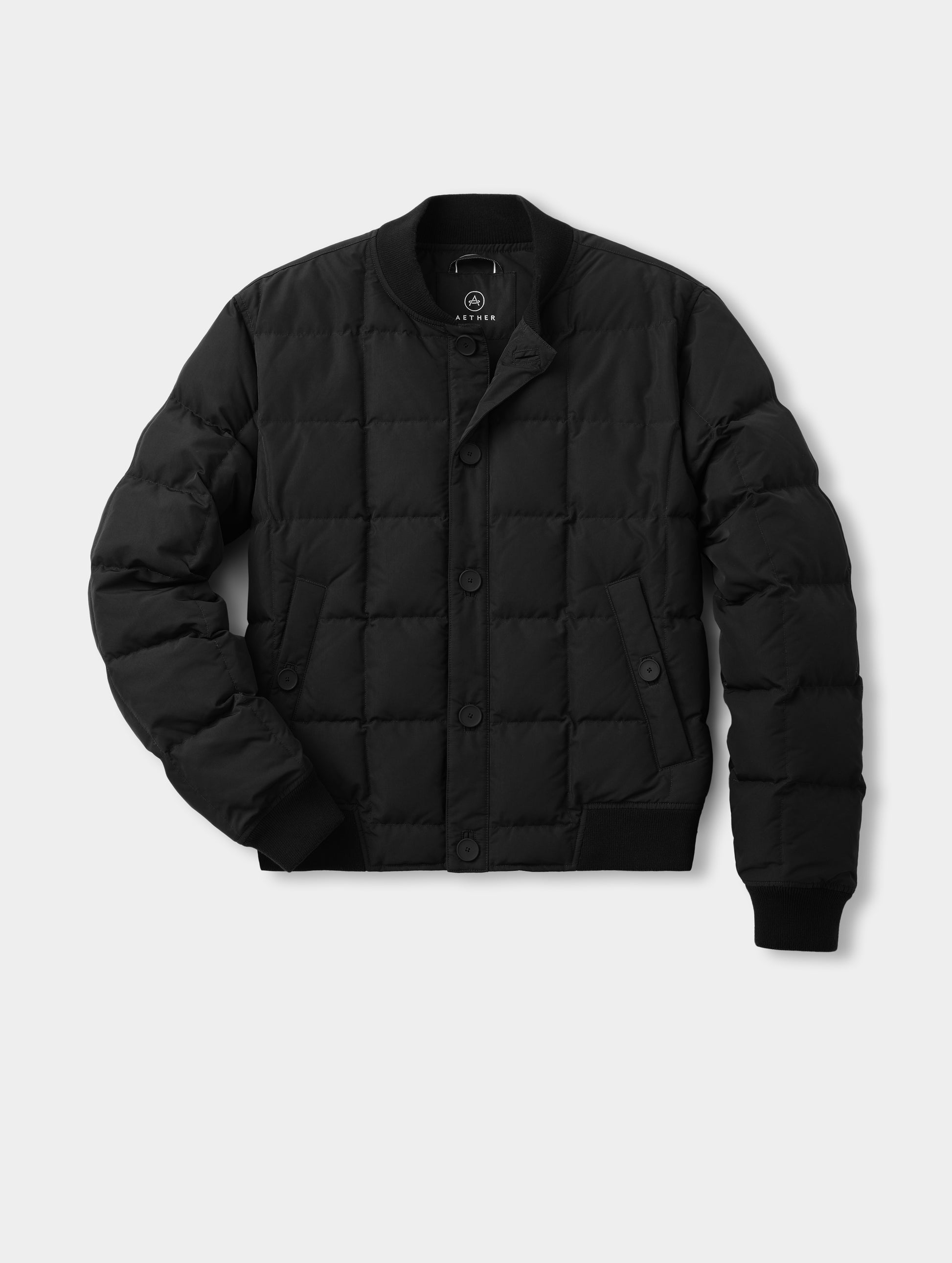 Flat lay of the Pacer Jacket in Onyx Black from AETHER Apparel.