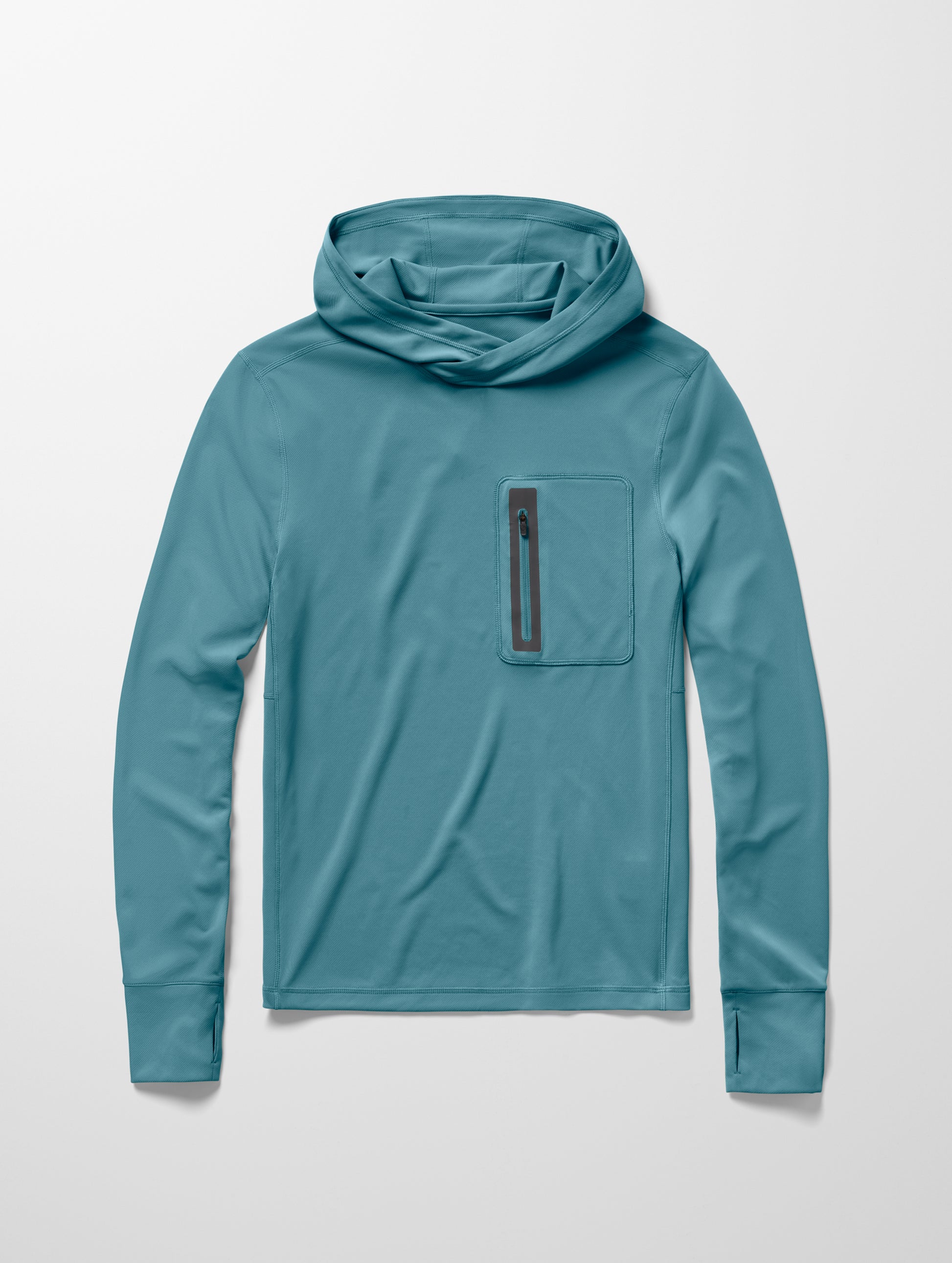 Flay lay image of men’s Pacific Hooded Sun Shirt in Aqua Blue from AETHER Apparel.