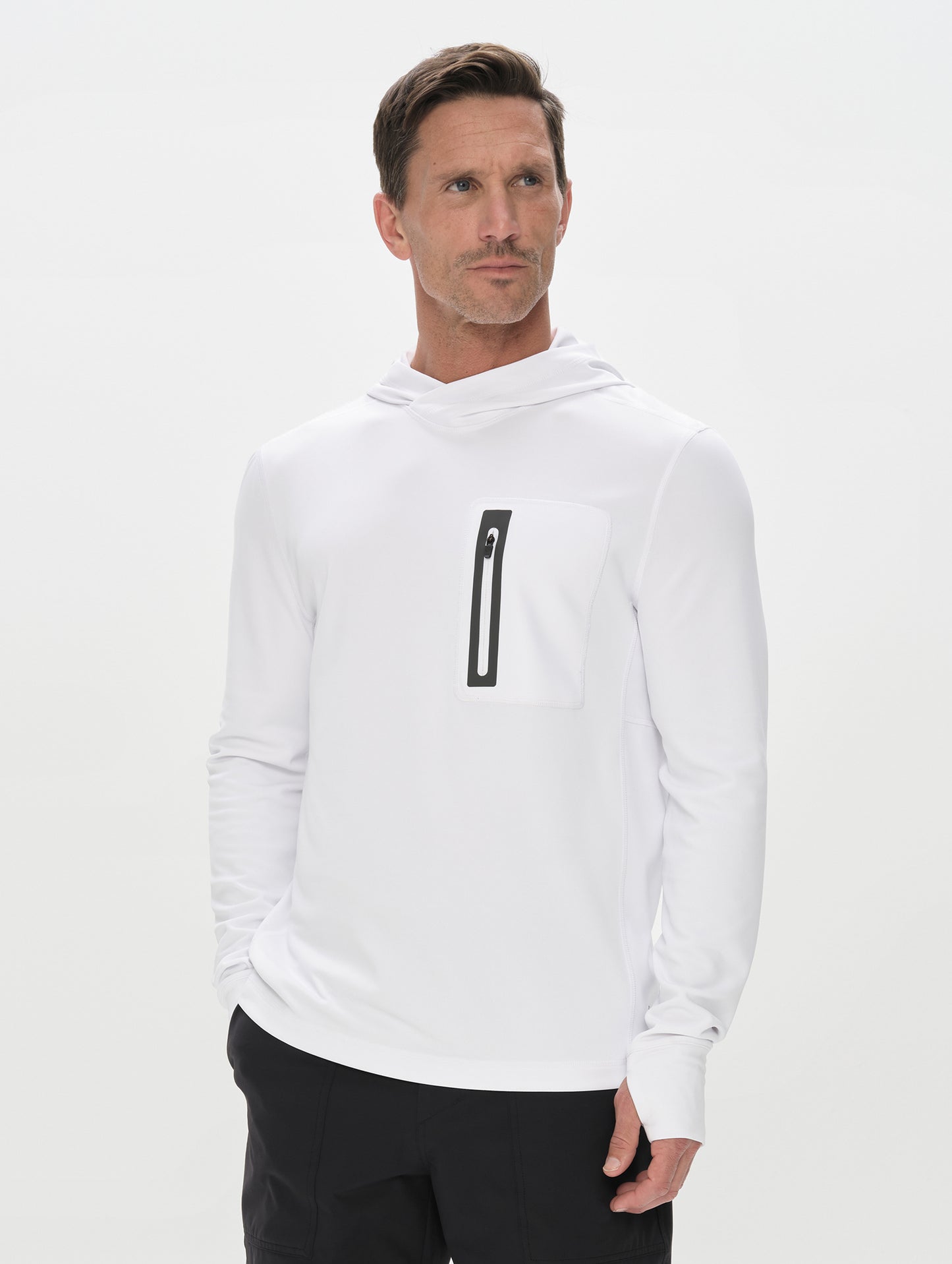 Front upper-body view of man wearing Pacific Hooded Sun Shirt in White from AETHER Apparel.