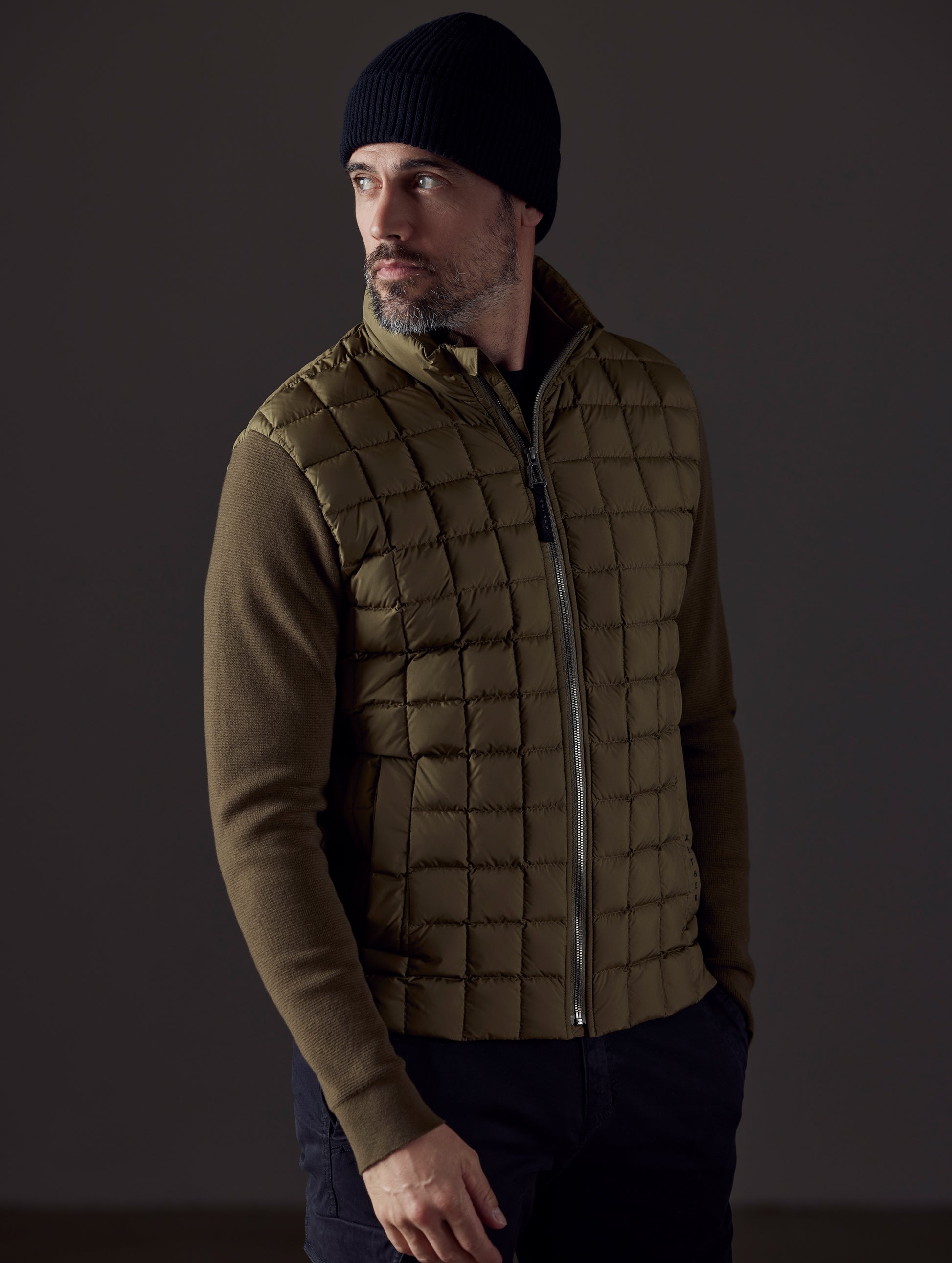man wearing green insulated jacket from AETHER Apparel