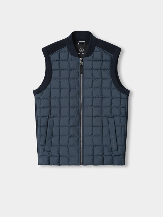 Flat lay view of the M Phase Vest in Total Eclipse from AETHER Apparel. 