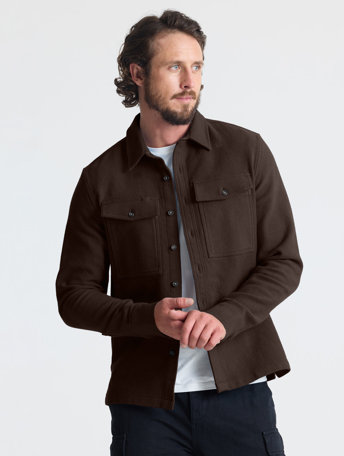 Front upper-body view of man wearing the Pioneer Heavyweight Button-Down in Ash Brown from AETHER Apparel.