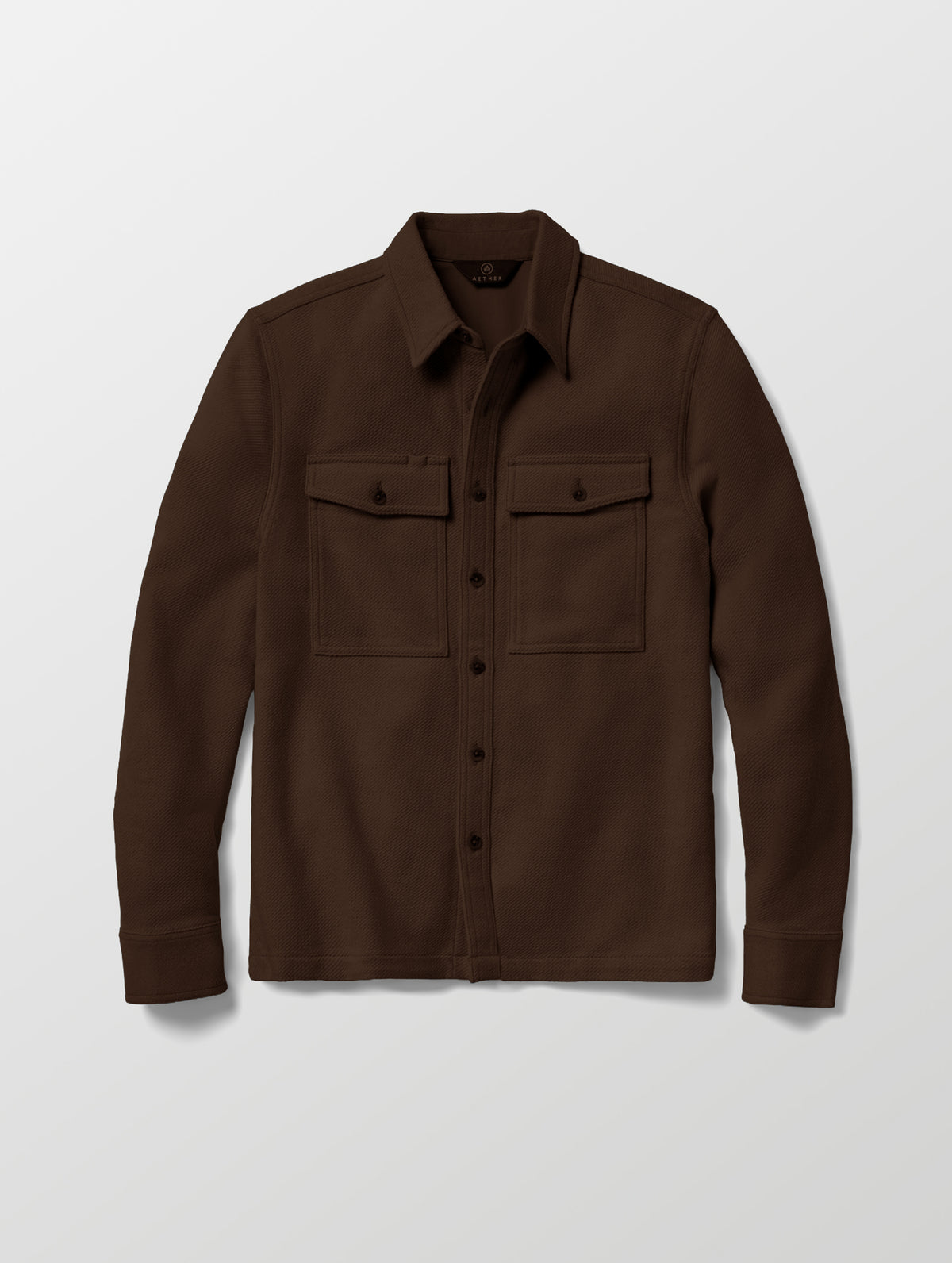 Flat lay of the Pioneer Heavyweight Button-Down in Ash Brown from AETHER Apparel.