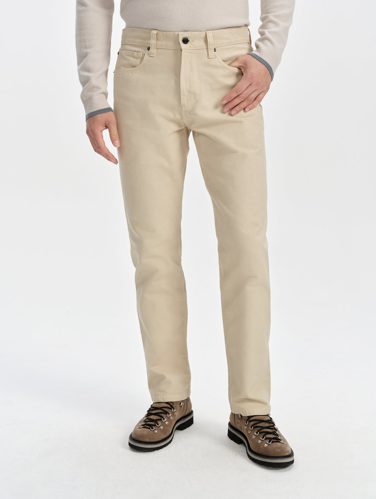 Front lower-body view of man wearing the Porter 5-Pocket Pant in Bone from AETHER Apparel.