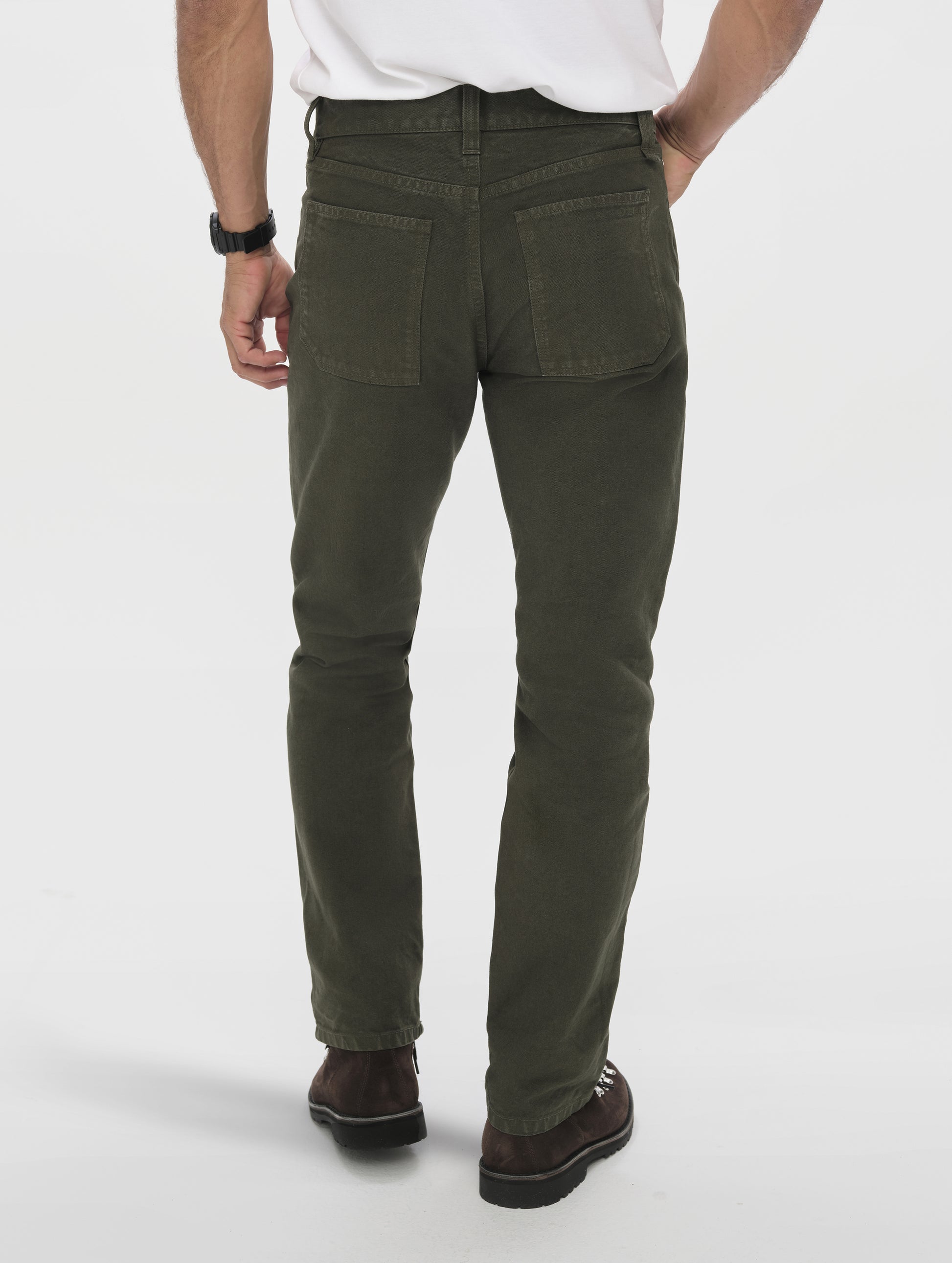 Rear lower-body view of man wearing the Porter 5-Pocket Pant in Forest Green from AETHER Apparel.