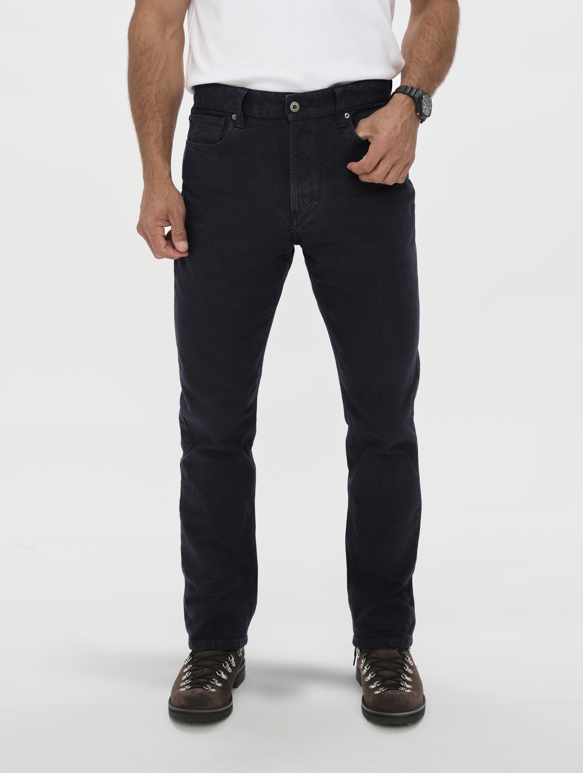 Front lower-body view of man wearing the Porter 5-Pocket Pant in Onyx Black from AETHER Apparel.