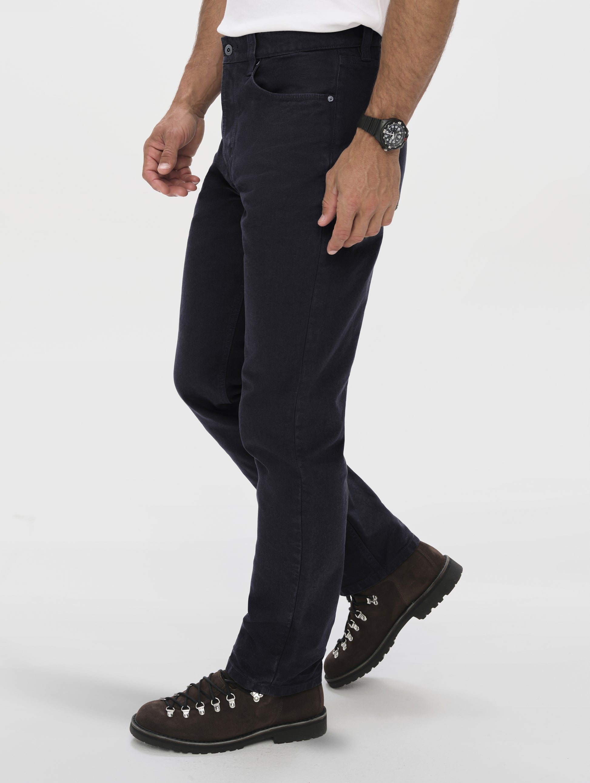Front angled lower-body view of man wearing the Porter 5-Pocket Pant in Onyx Black from AETHER Apparel.