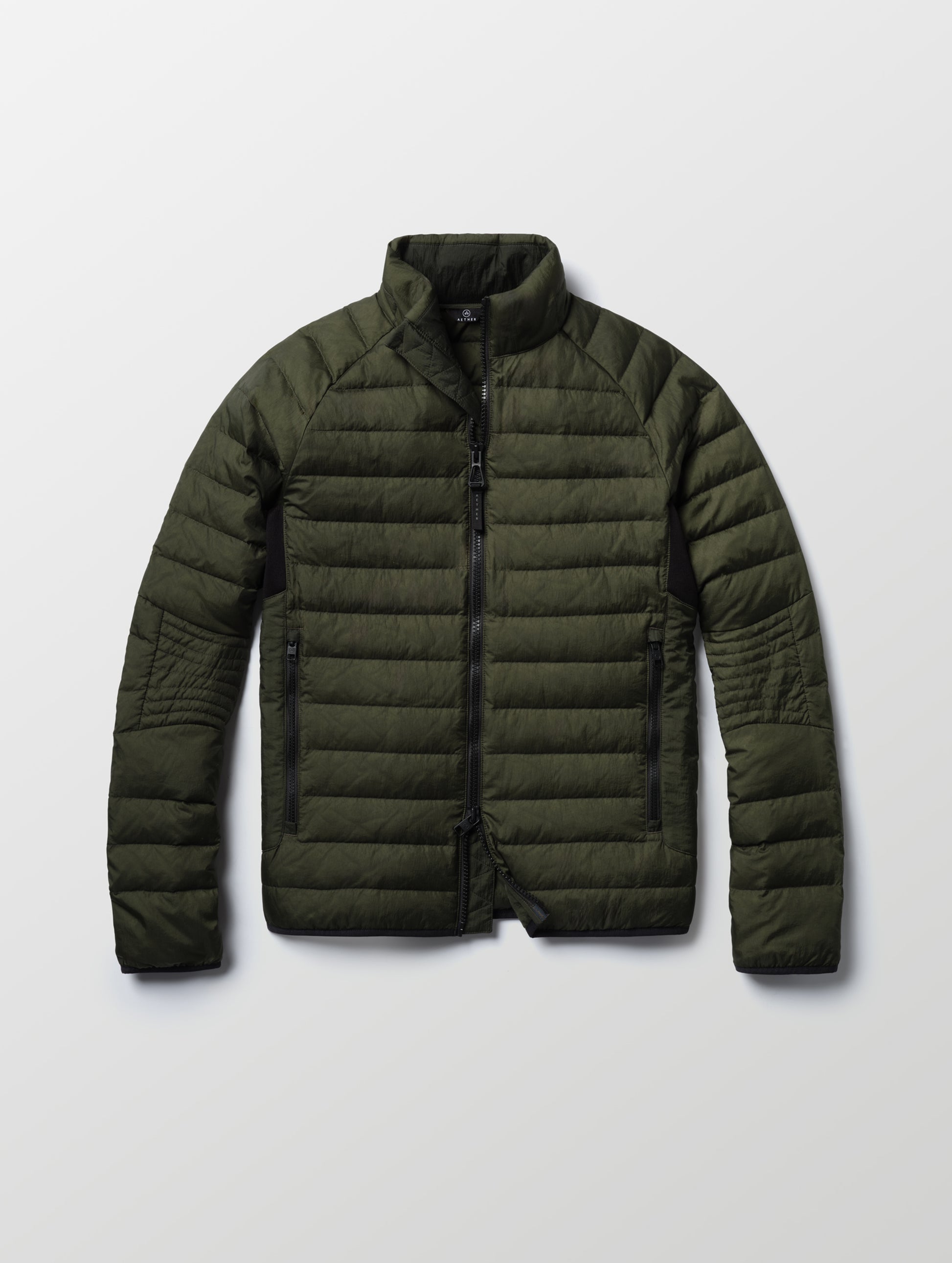 Flat lay of Prospect Packable Down Jacket in Forest Green from AETHER Apparel.