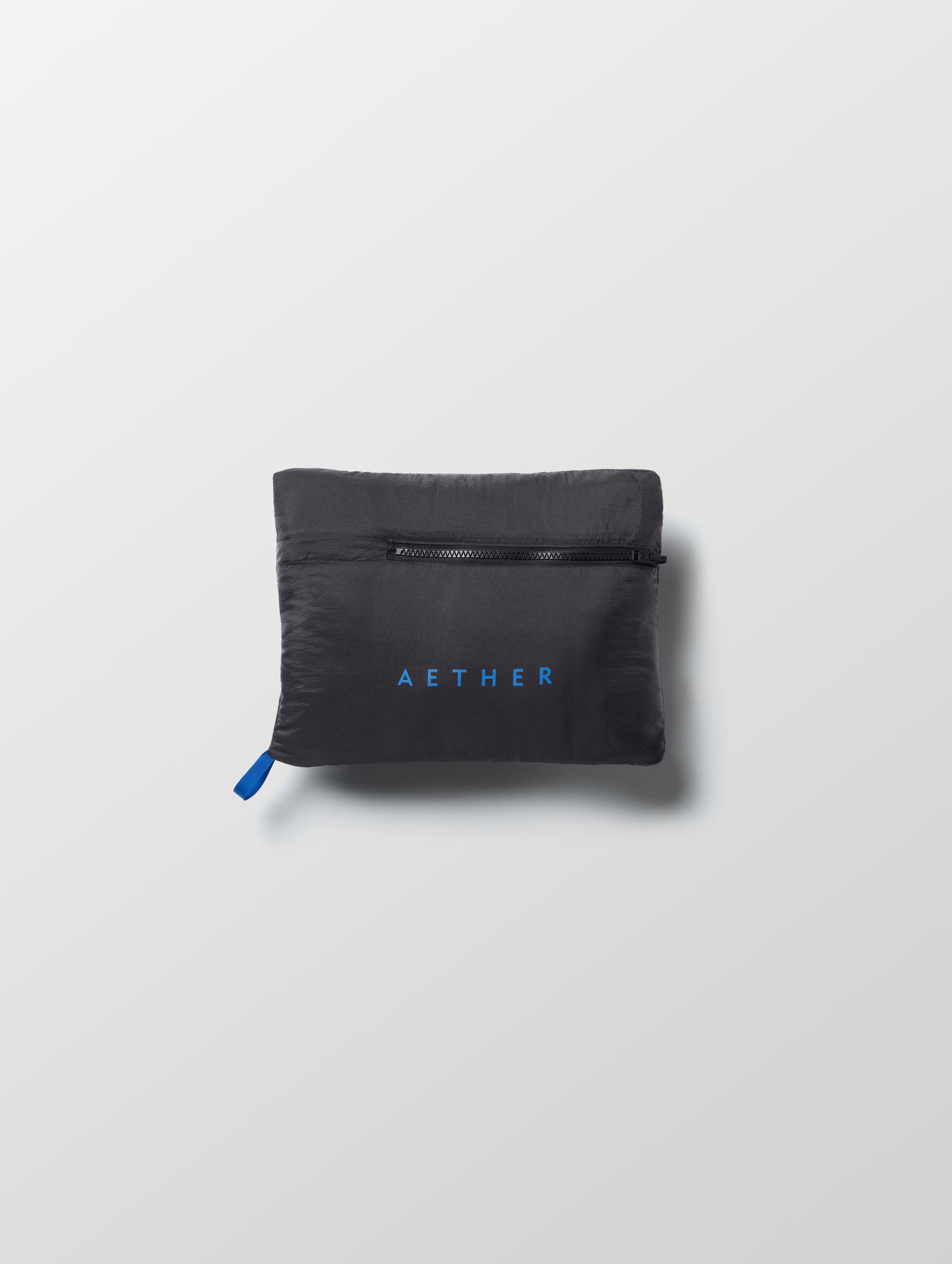 Self-packed Prospect Packable Down Jacket in Onyx Black from AETHER Apparel.