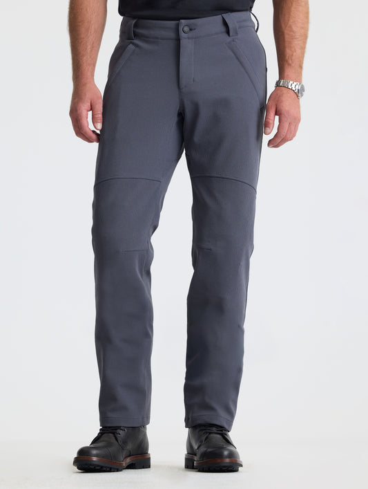 Front lower-body view of man wearing Ramble Pant 3.0 in Graphite from AETHER Apparel. 