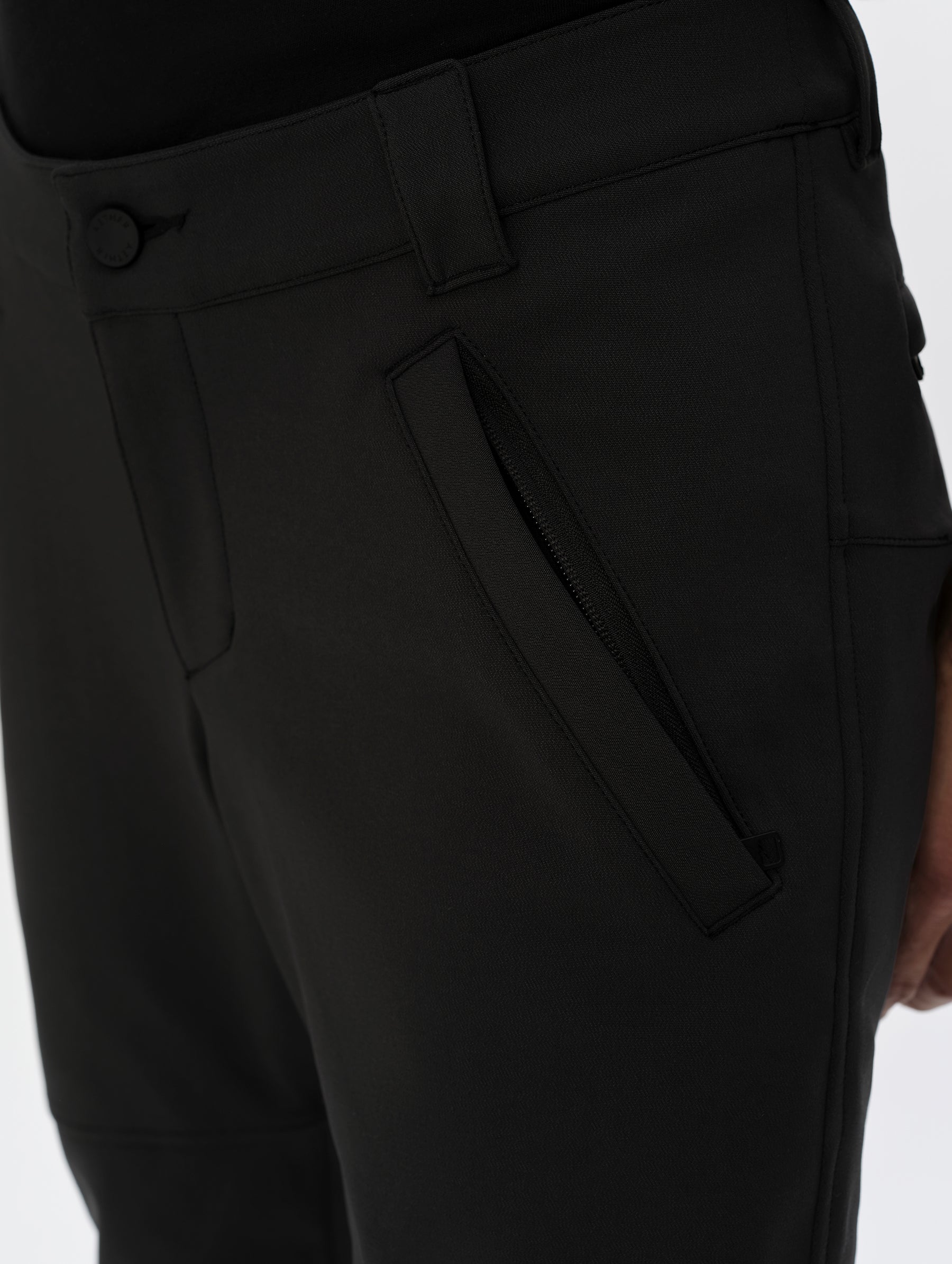 Closeup detailed view of the zipper-secured hand pockets on the Ramble Motorcycle Pant 3.0 in Onyx Black from AETHER Apparel.