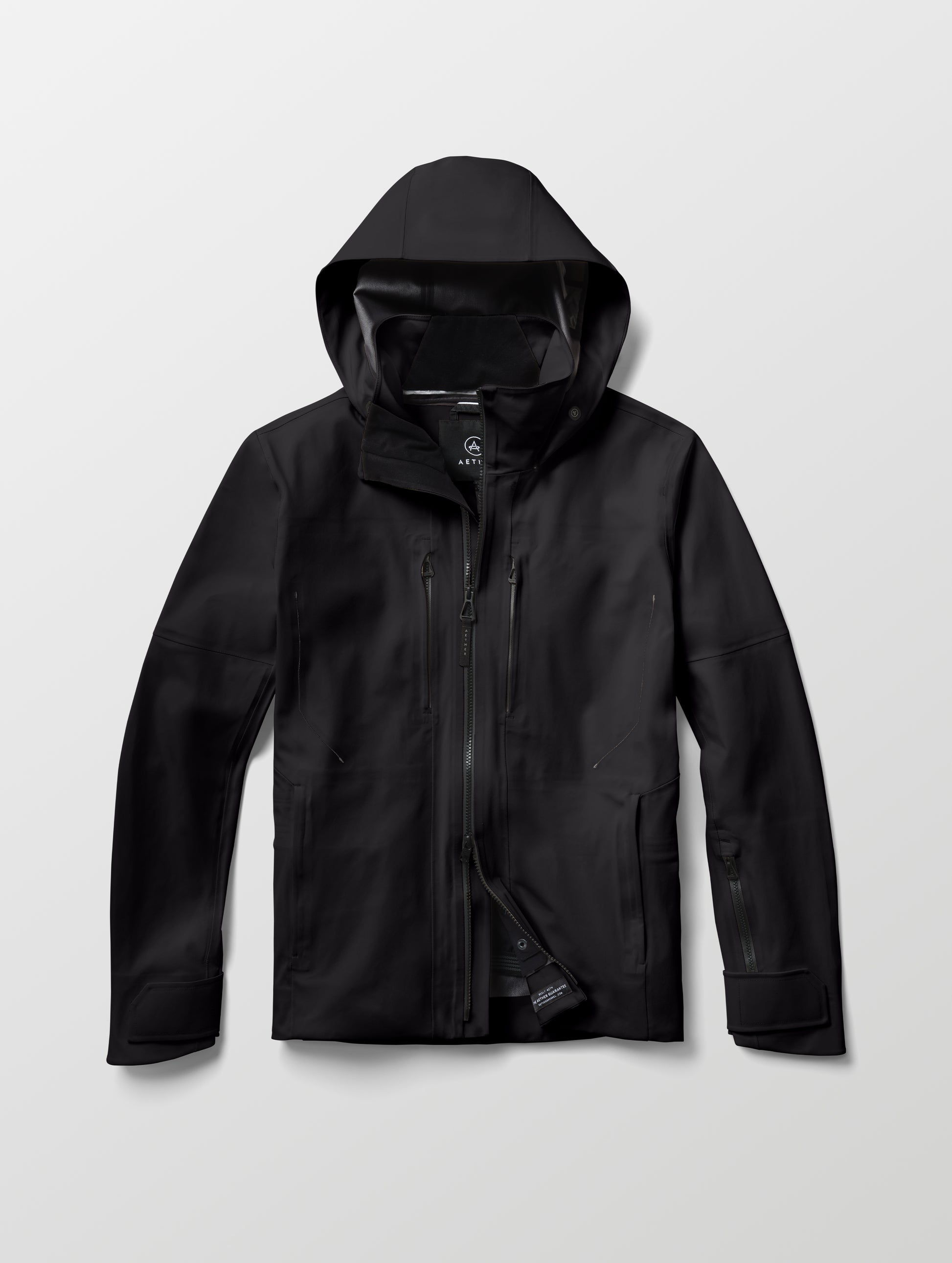 Flat lay of the Ridge Snow-Shell Jacket in Onyx Black from AETHER Apparel.