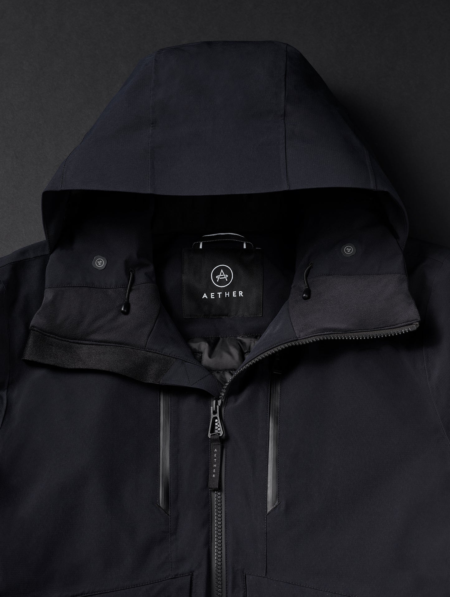 black insulated jacket from AETHER Apparel