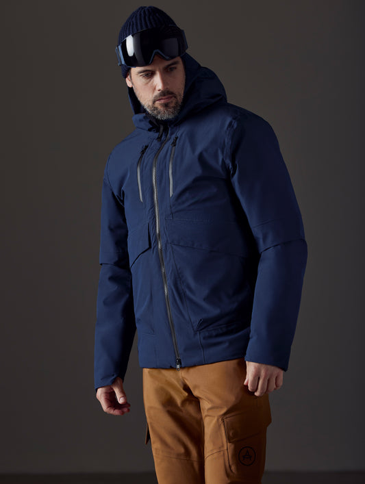 man wearing blue insulated jacket from AETHER Apparel