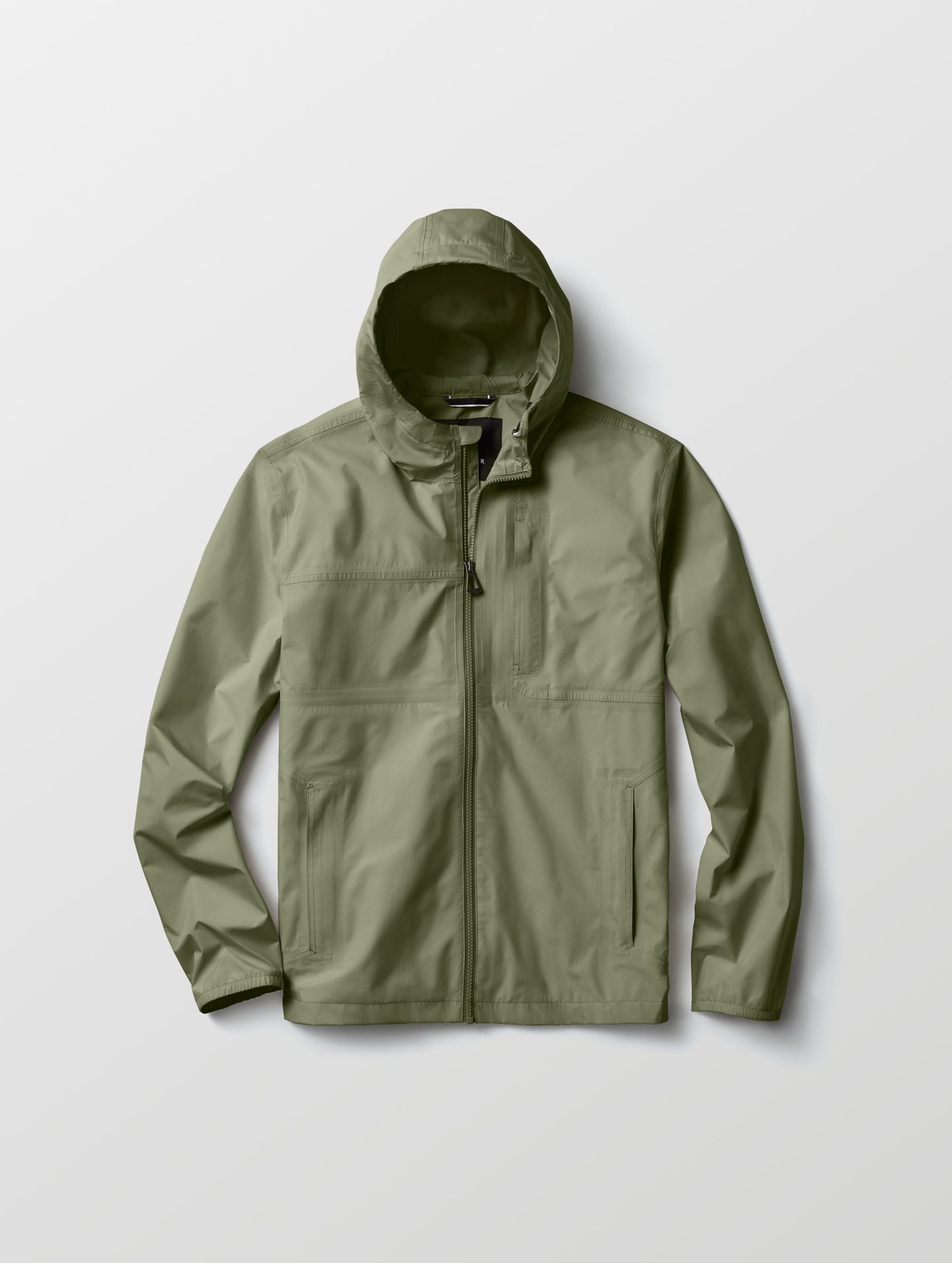Flat lay view of Storm All-Weather Jacket in Fern Green from AETHER Apparel.