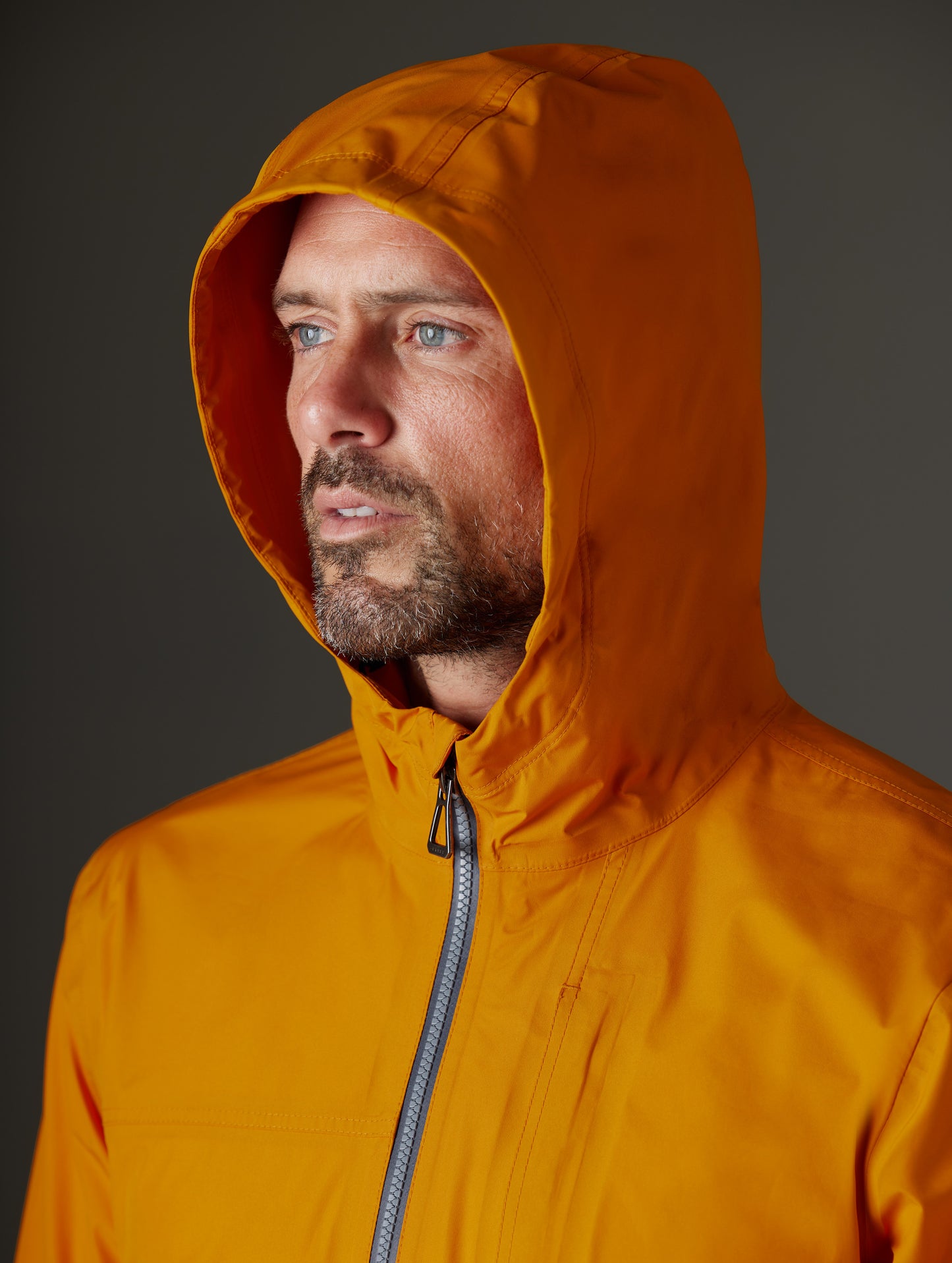 man wearing orange jacket from AETHER Apparel