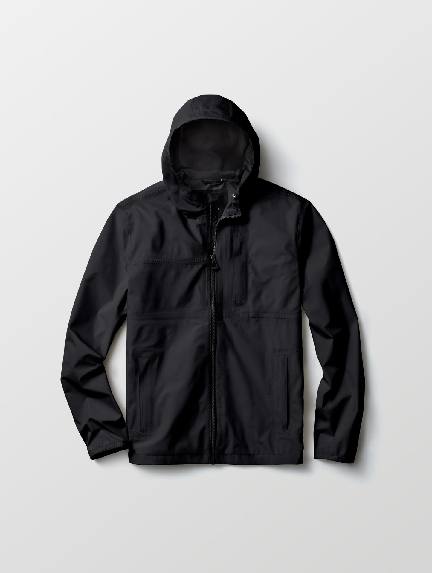 Flat lay view of Storm All-Weather Jacket in Onyx Black from AETHER Apparel.