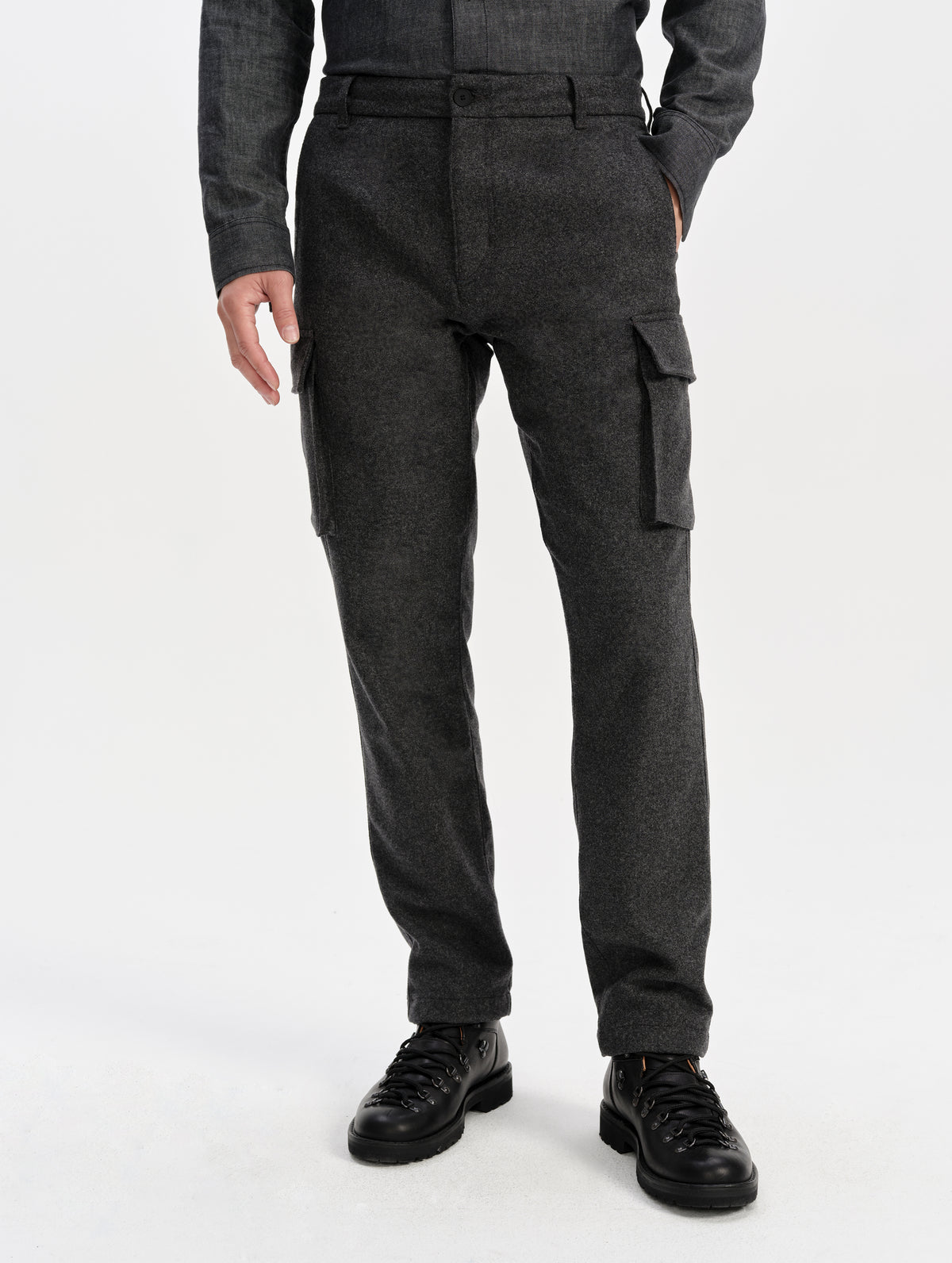 Front lower-body view of man wearing the Strata Wool Pant in Charcoal Heather from AETHER Apparel.