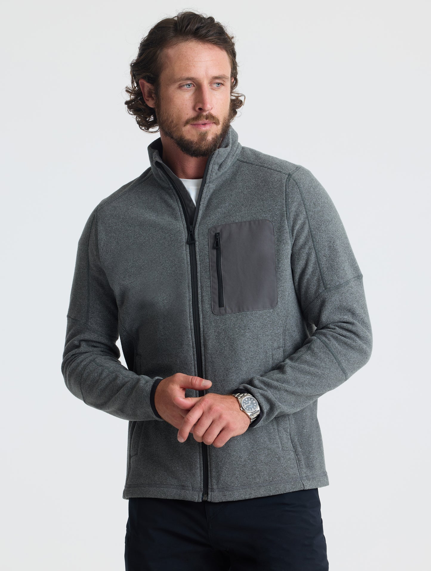 Front view of man wearing Sutherlin Full-Zip in Charcoal Grey from AETHER Apparel.