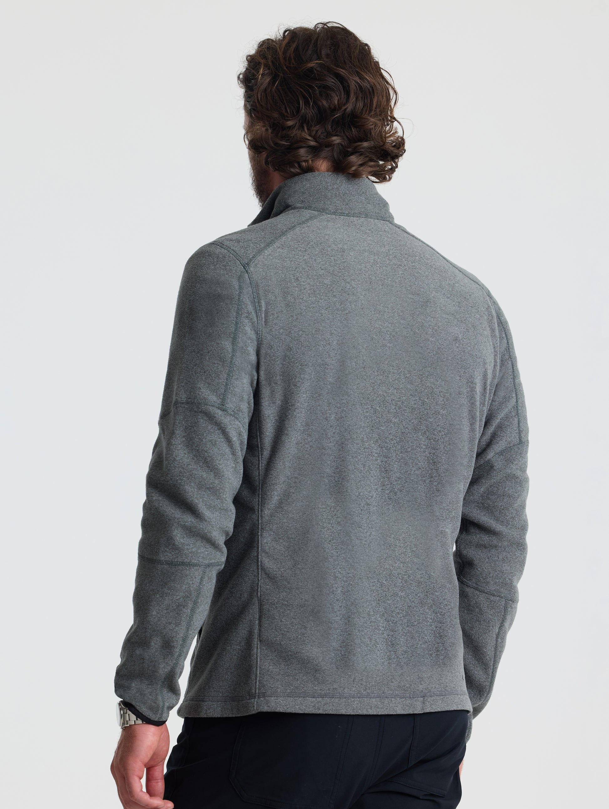 Rear view of man wearing Sutherlin Full-Zip in Charcoal Grey from AETHER Apparel.