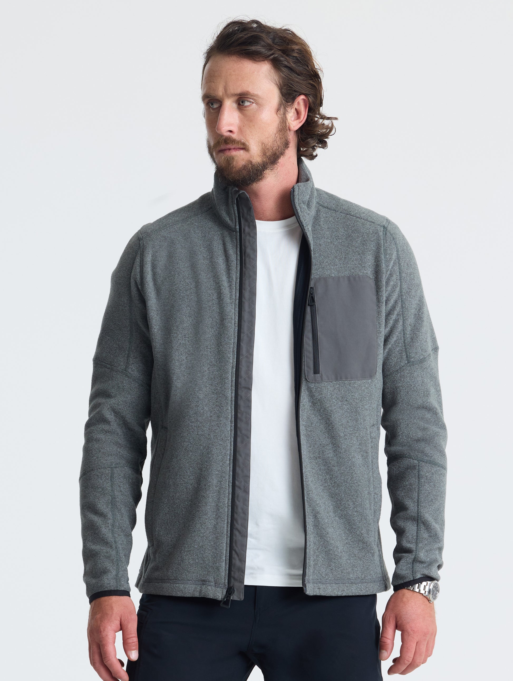 Front view of man wearing unzipped Sutherlin Full-Zip in Charcoal Grey from AETHER Apparel.