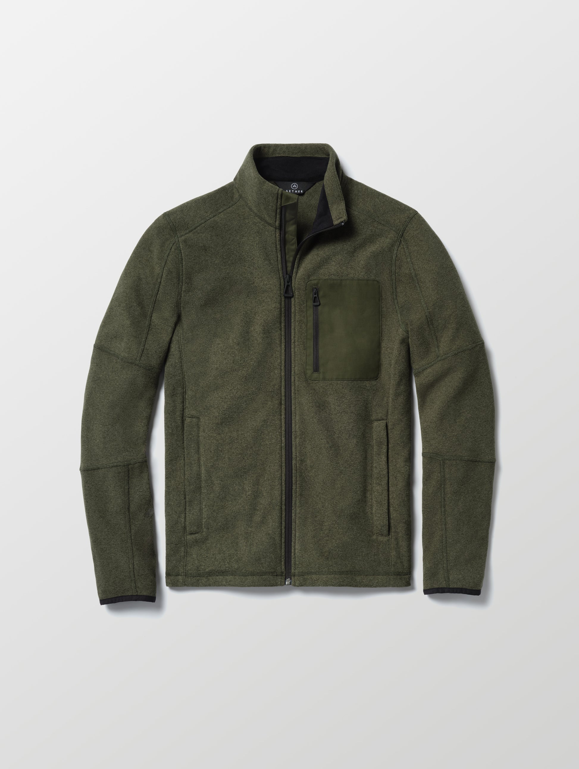 Flay lay of Sutherlin Full-Zip in Forest Green from AETHER Apparel.