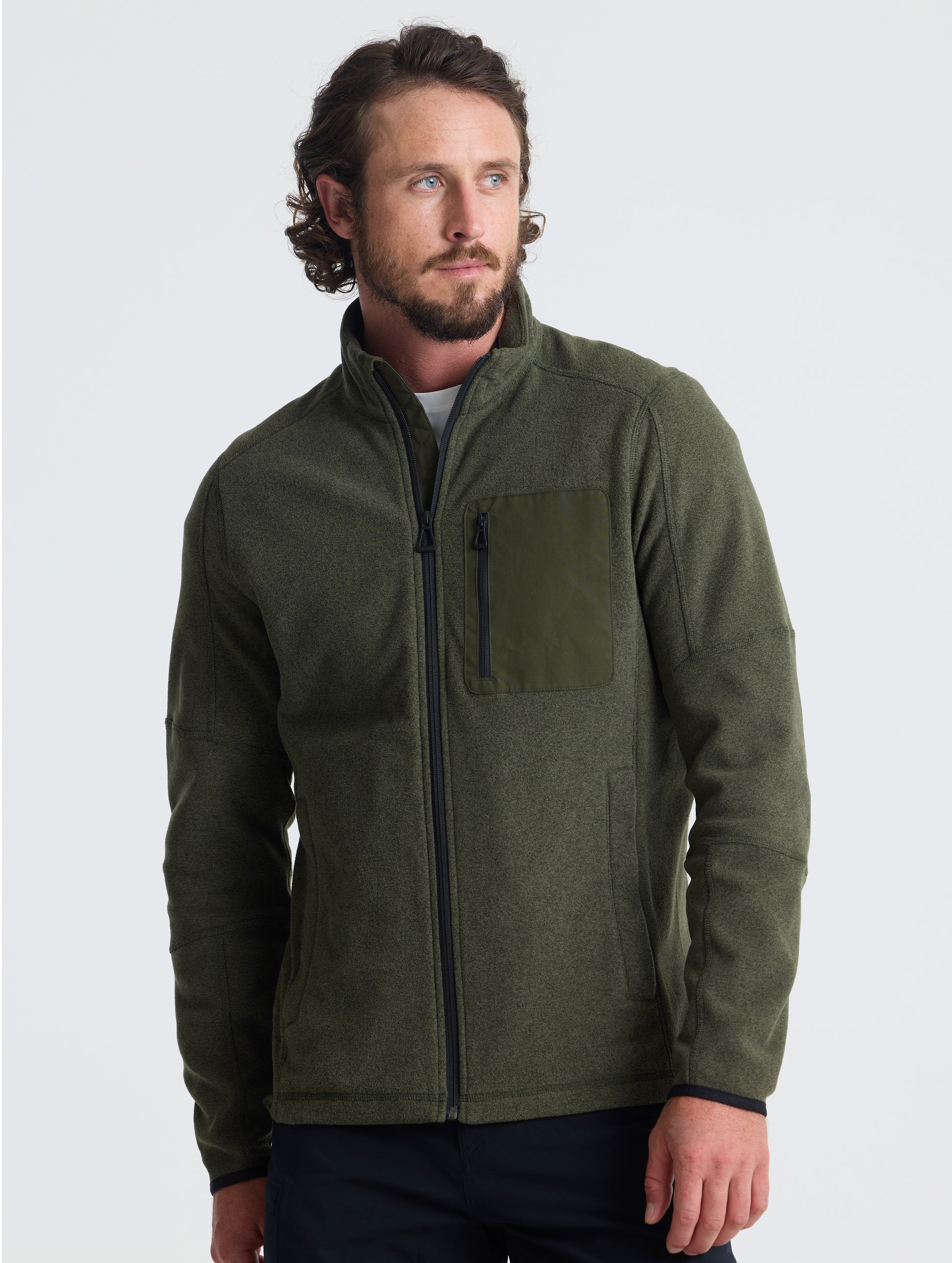 Front view of man wearing Sutherlin Full-Zip in Forest Green from AETHER Apparel.