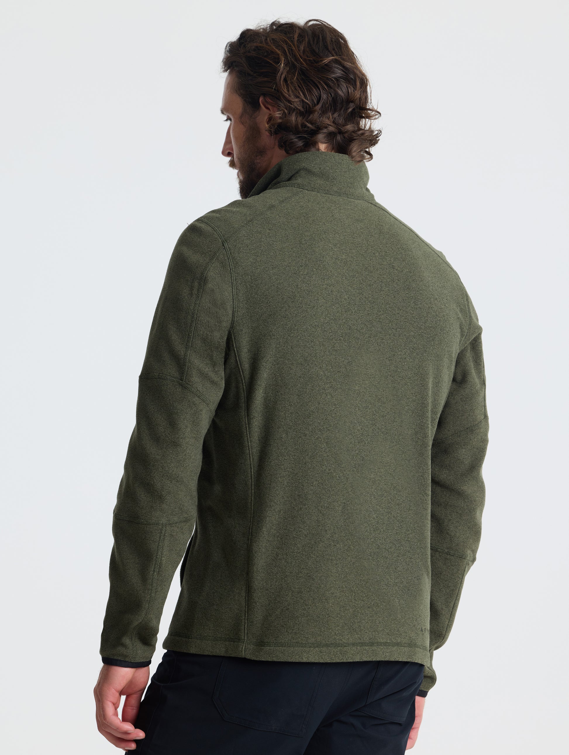 Rear view of man wearing Sutherlin Full-Zip in Forest Green from AETHER Apparel.