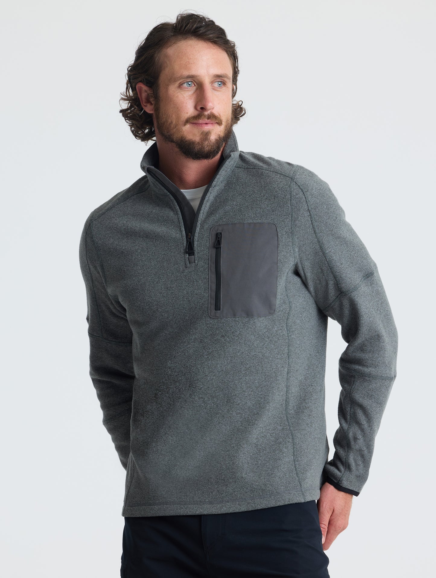 Front view of man wearing Sutherlin Half-Zip in Charcoal Heather from AETHER Apparel.