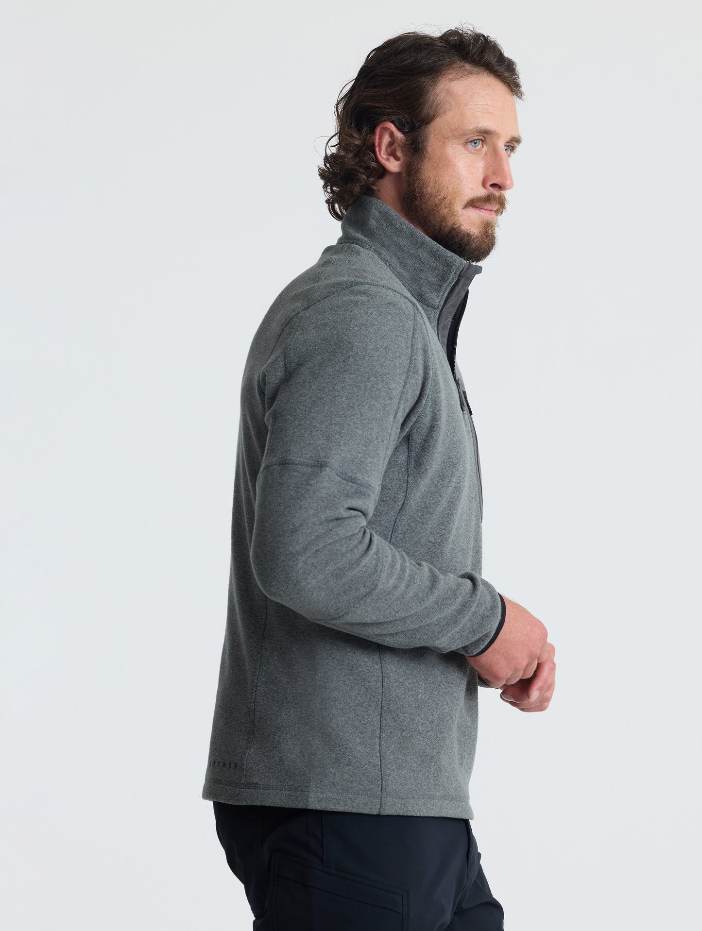 Right profile view of man wearing Sutherlin Half-Zip in Charcoal Heather from AETHER Apparel.
