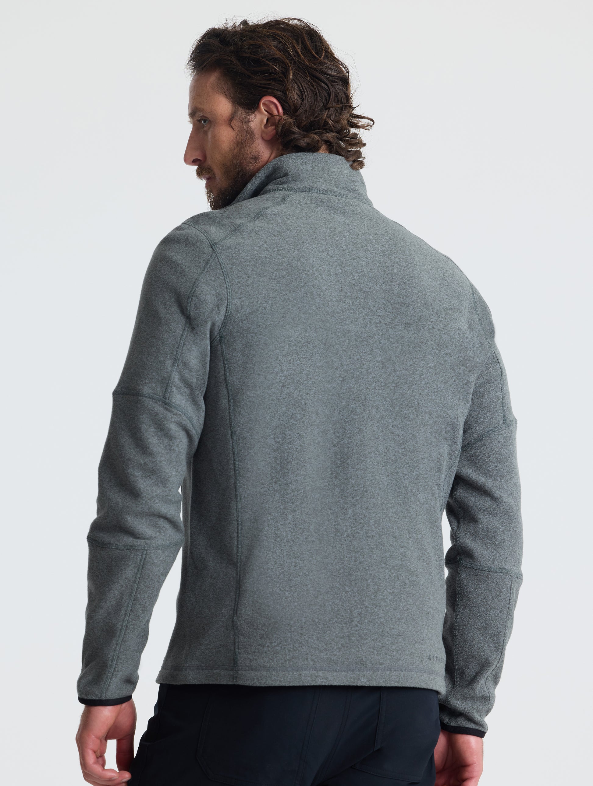 Rear view of man wearing Sutherlin Half-Zip in Charcoal Heather from AETHER Apparel.