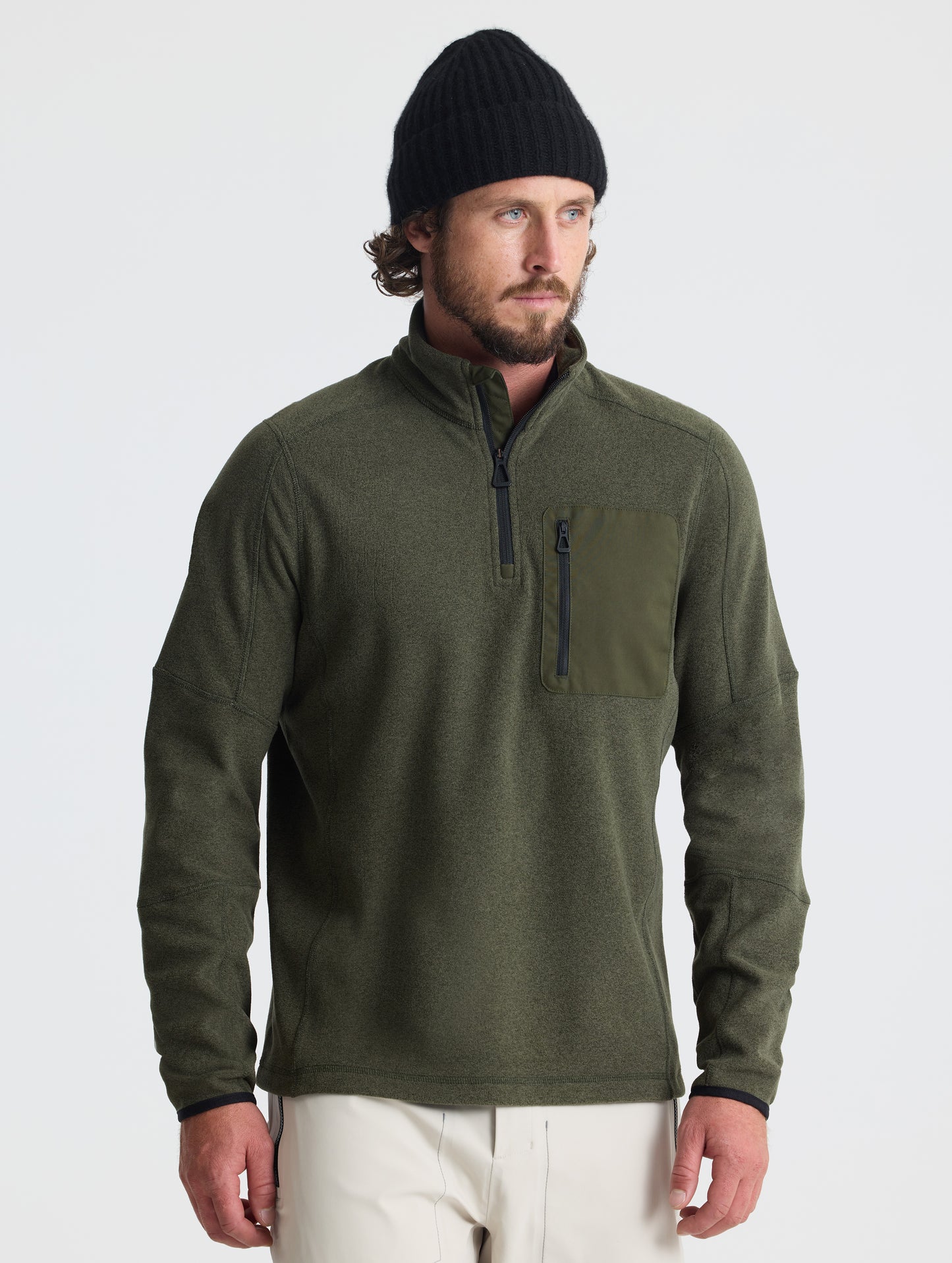 Front view of man wearing Sutherlin Half-Zip in Forest Green from AETHER Apparel.