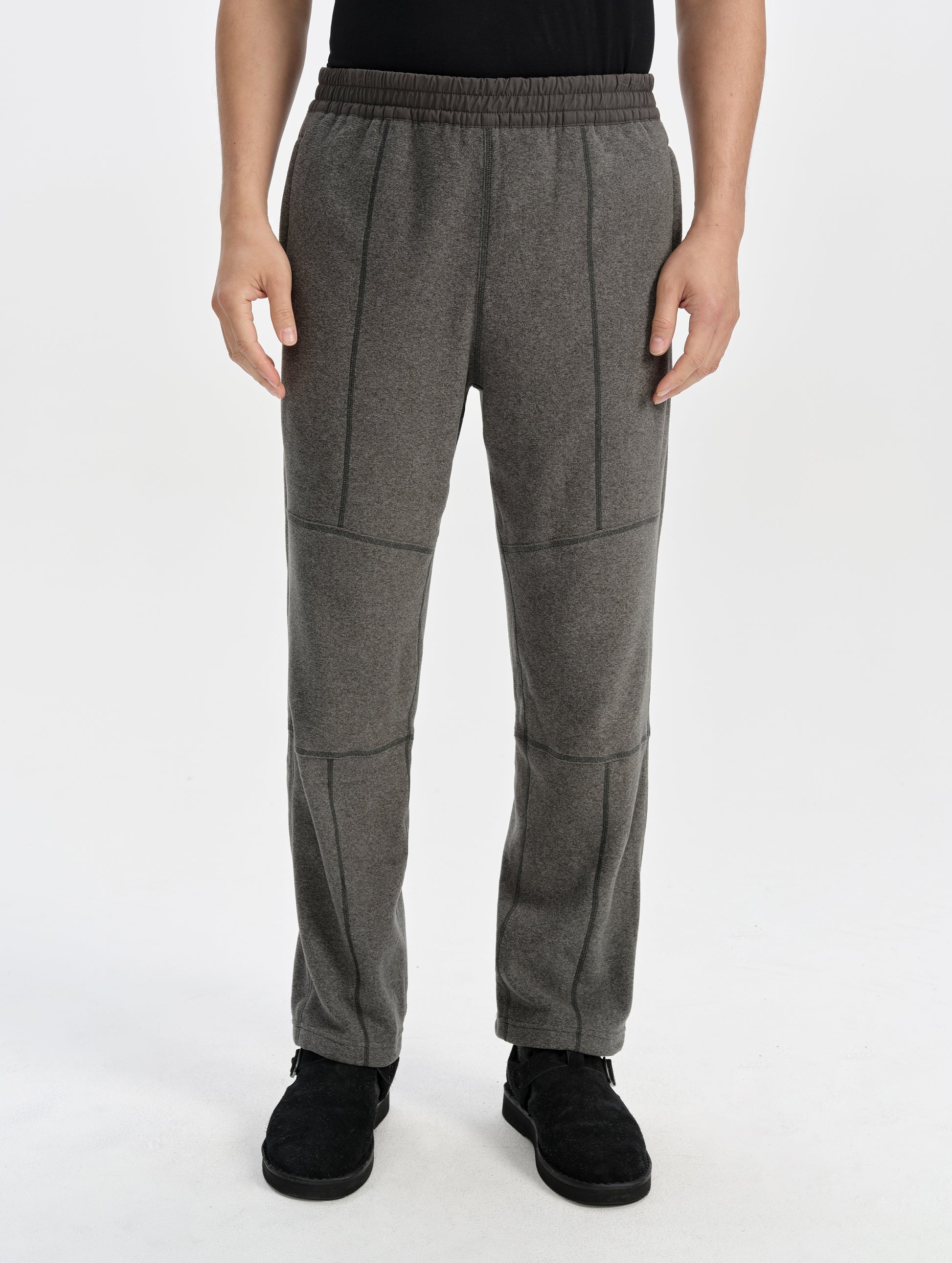 Front lower-body view of man wearing the Sutherlin Pant in Charcoal Grey from AETHER Apparel.