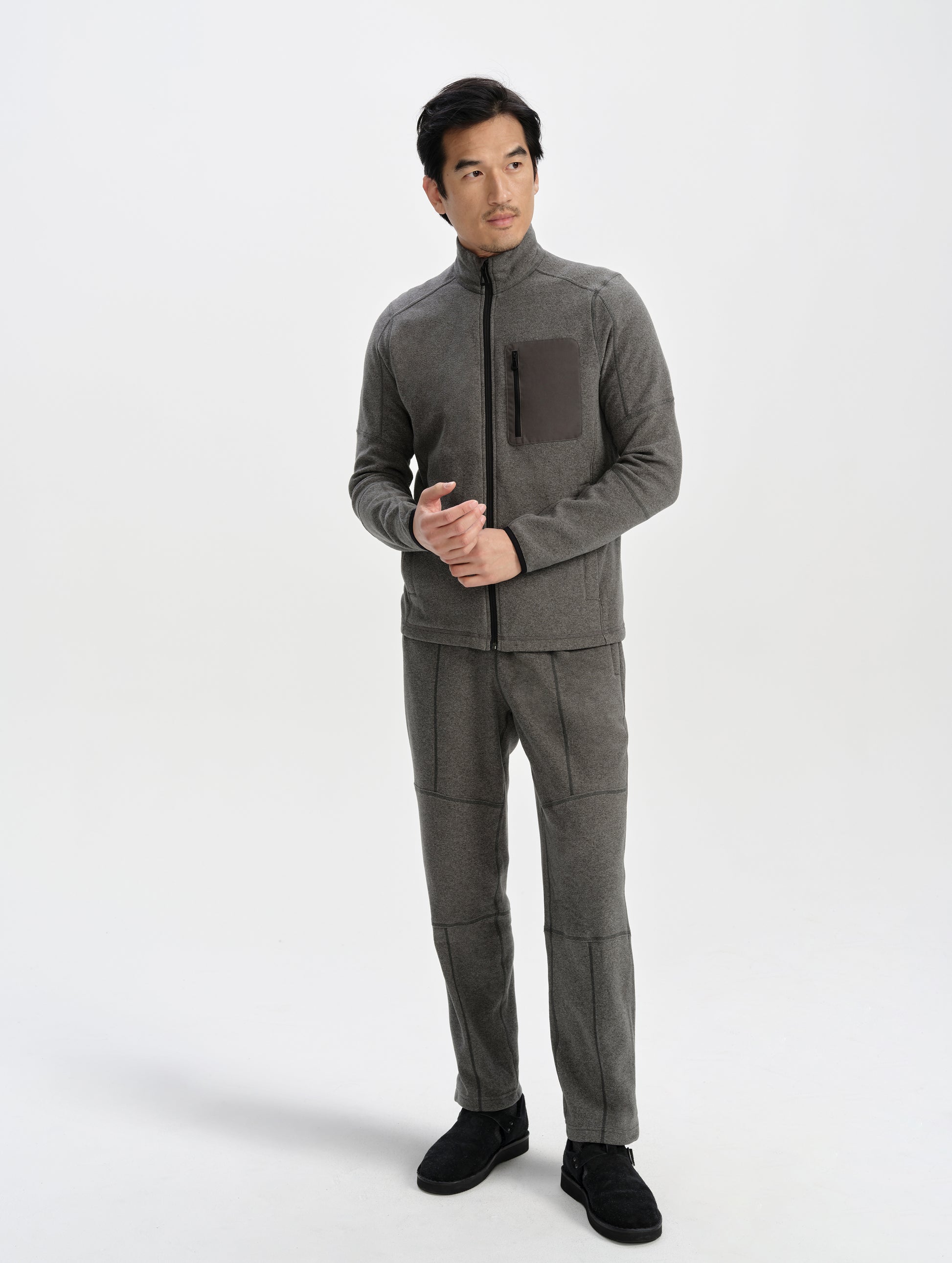 Front full-body view of man wearing the Sutherlin Pant in Charcoal Grey from AETHER Apparel.