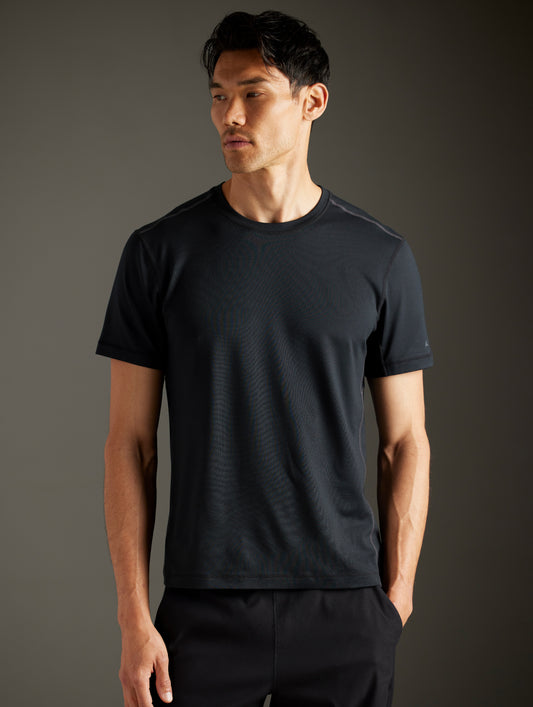 man wearing black tee from AETHER Apparel
