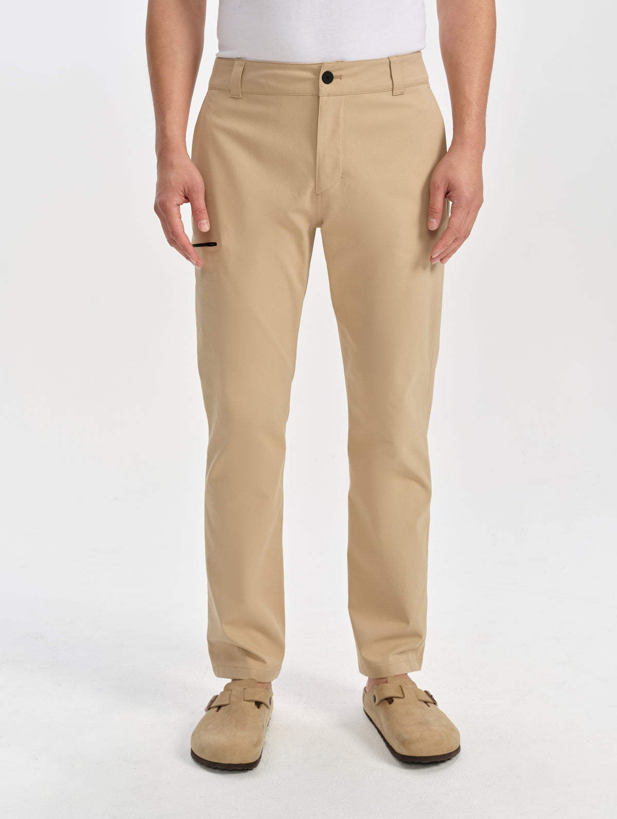 Front lower-body view of man wearing the Walden Tech Pant in Desert Tan from AETHER Apparel. 