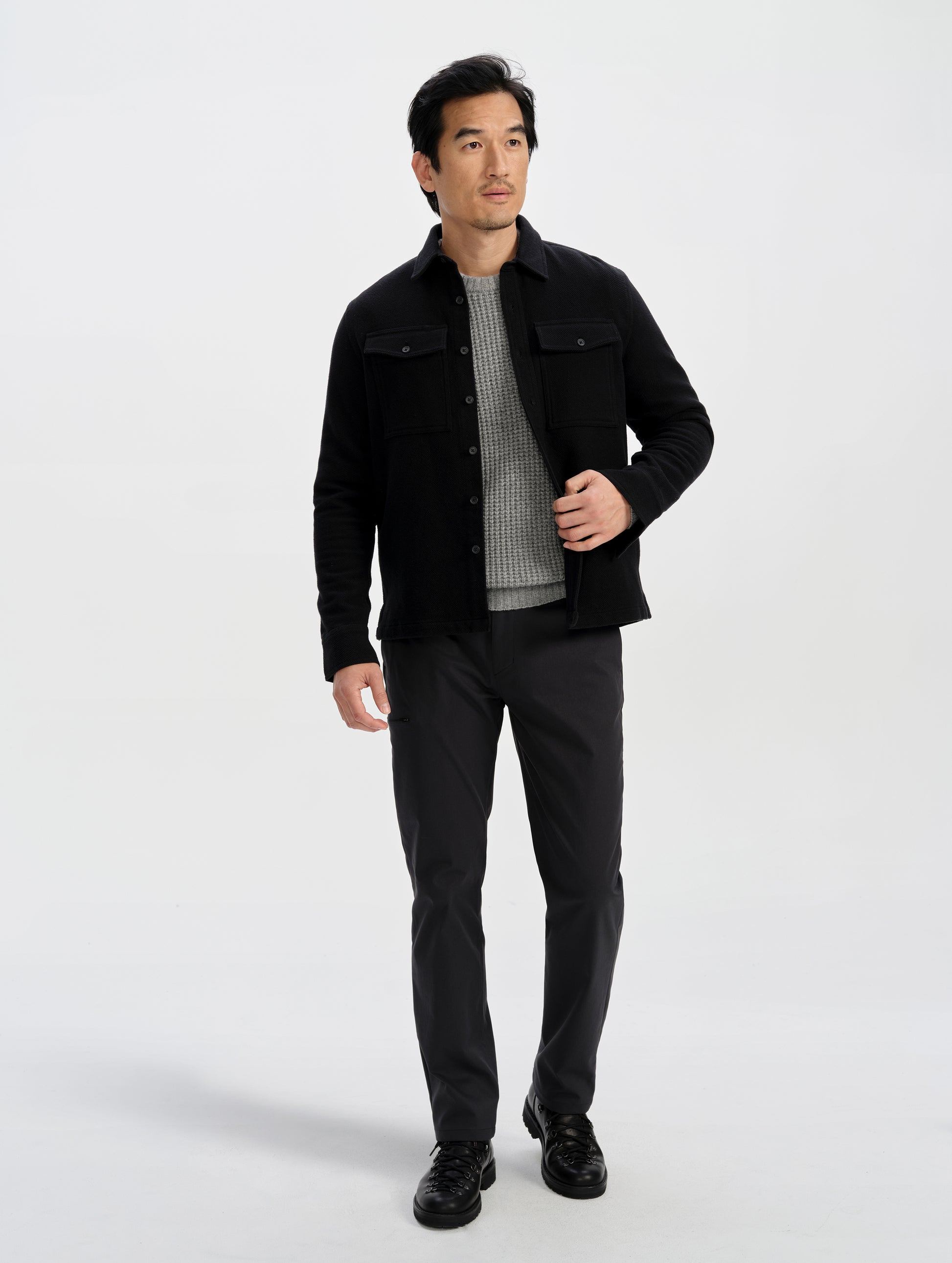 Front full-body view of man wearing the Walden Tech Pant in Onyx Black from AETHER Apparel. 