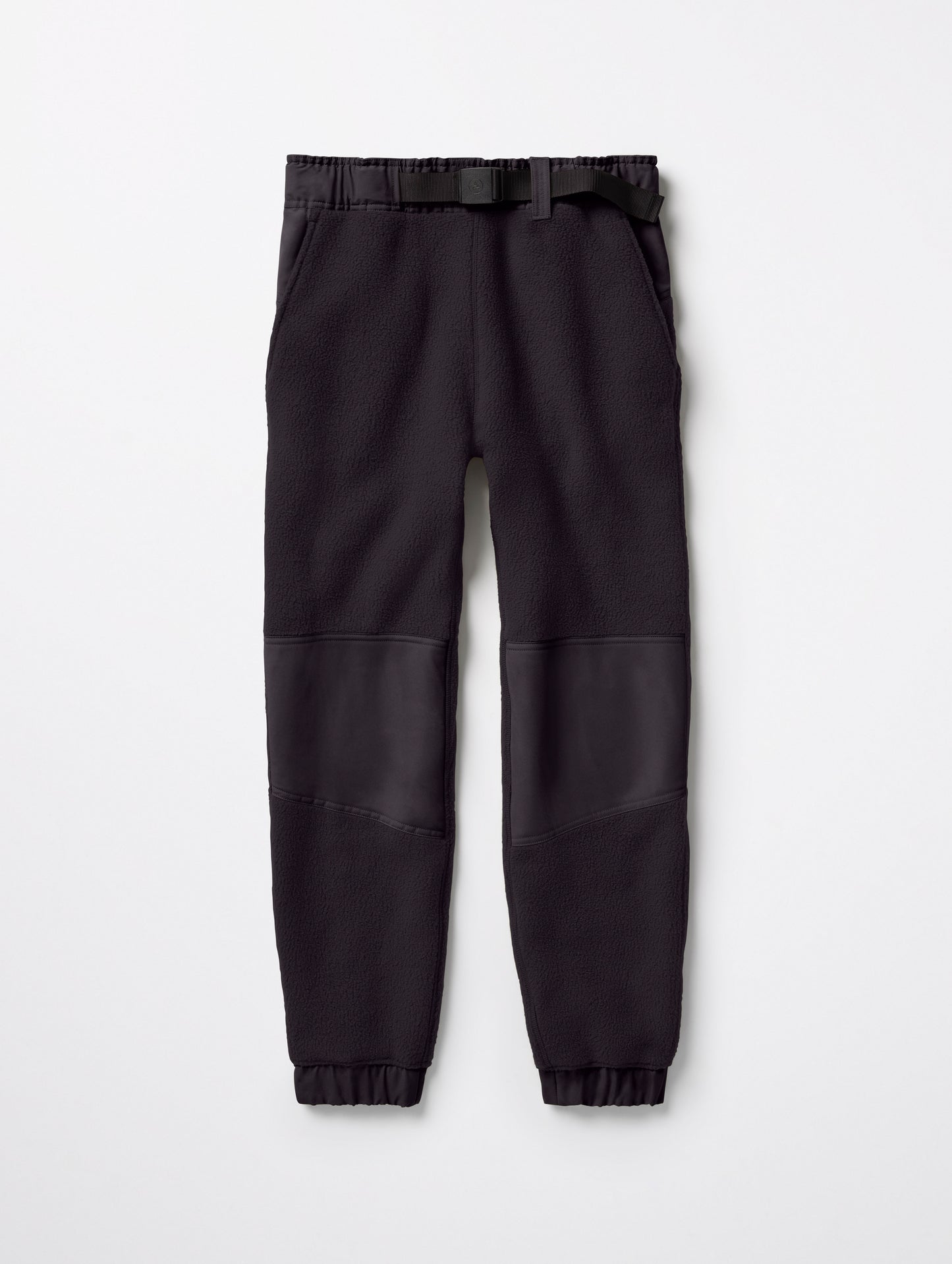 Flay lay of men's Walsh Pant in Onyx Black from AETHER Apparel.