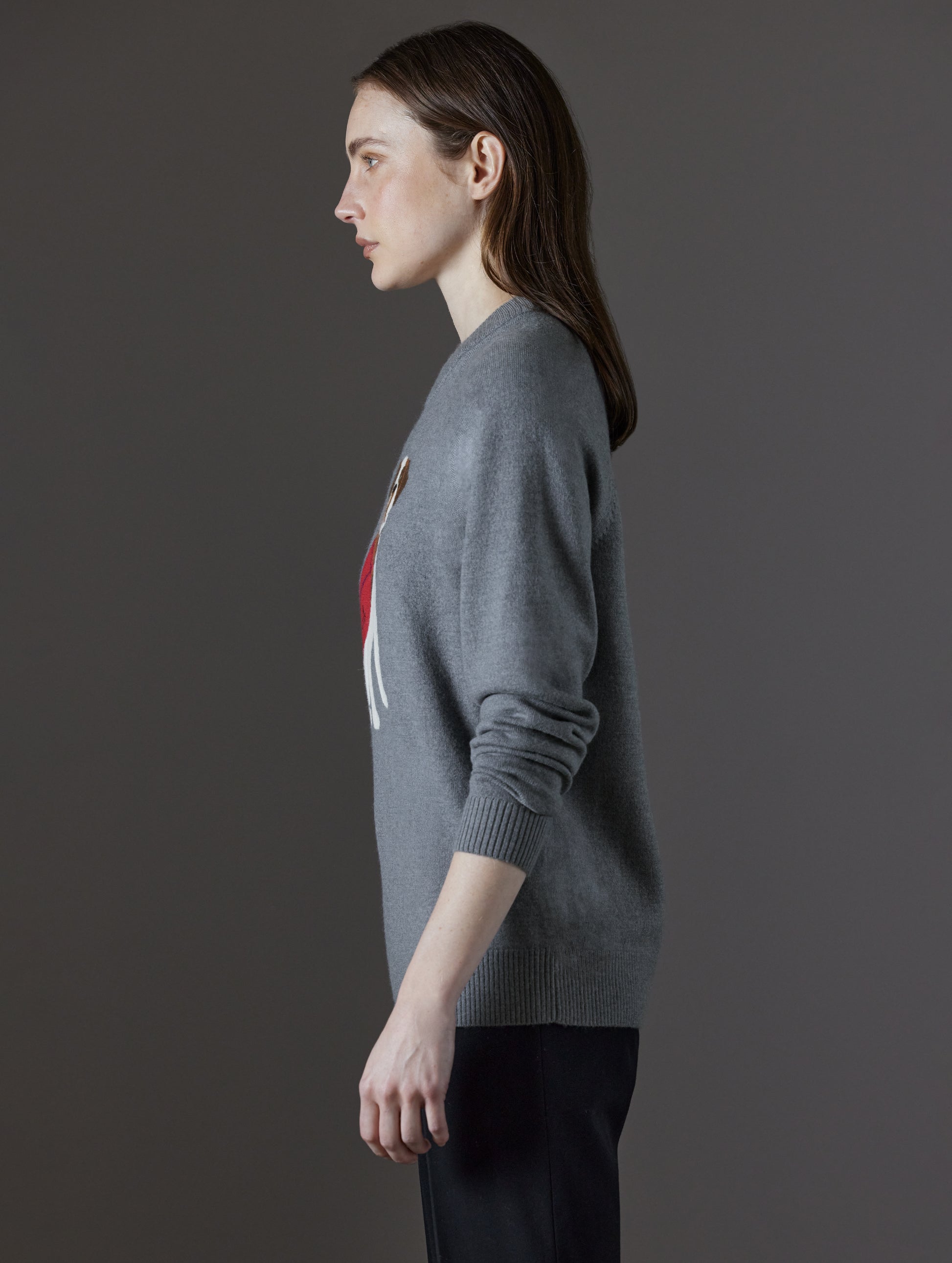 Woman wearing grey sweater from AETHER Apparel